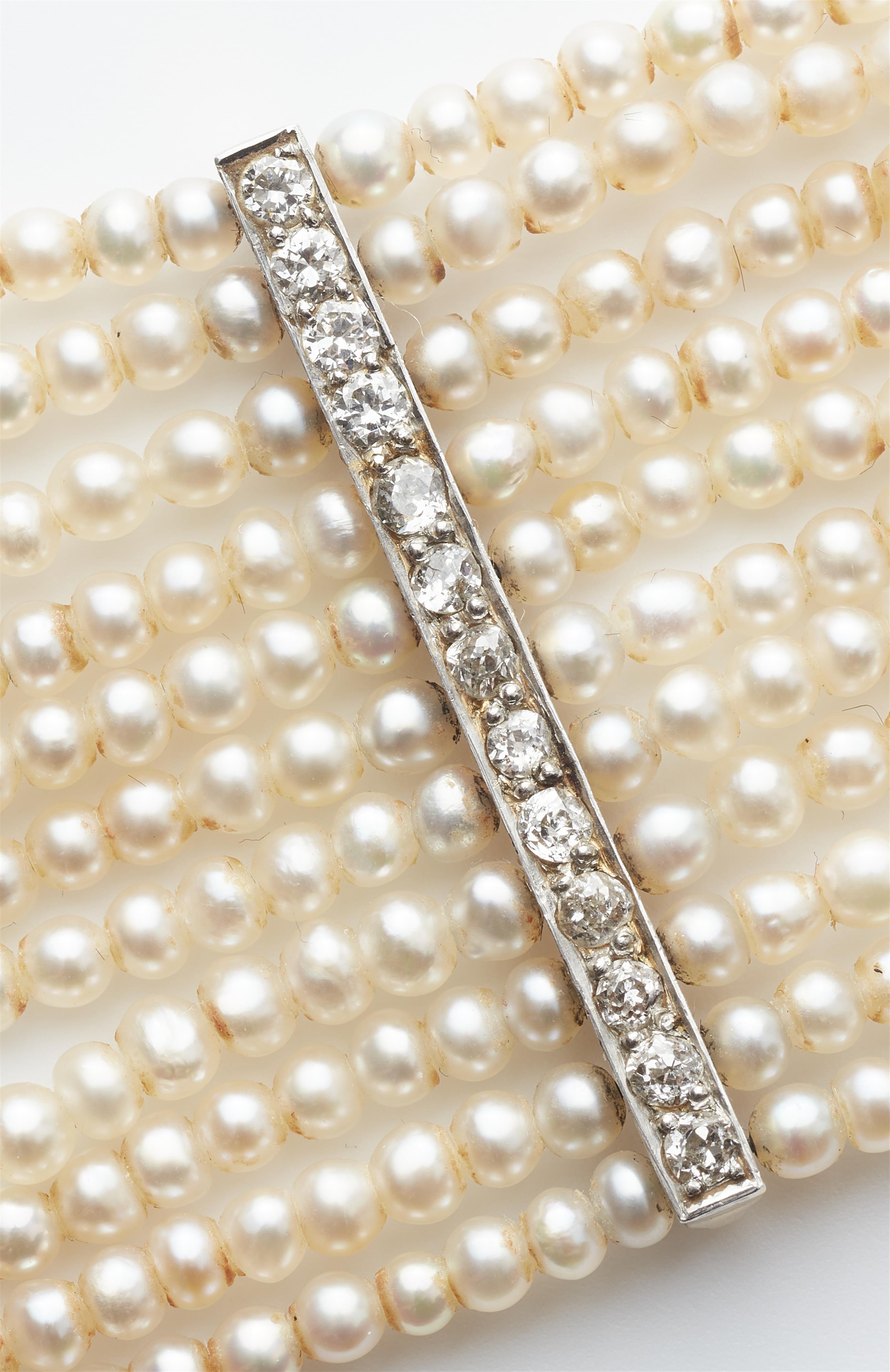 A 14k gold natural pearl and diamond choker. - image-2