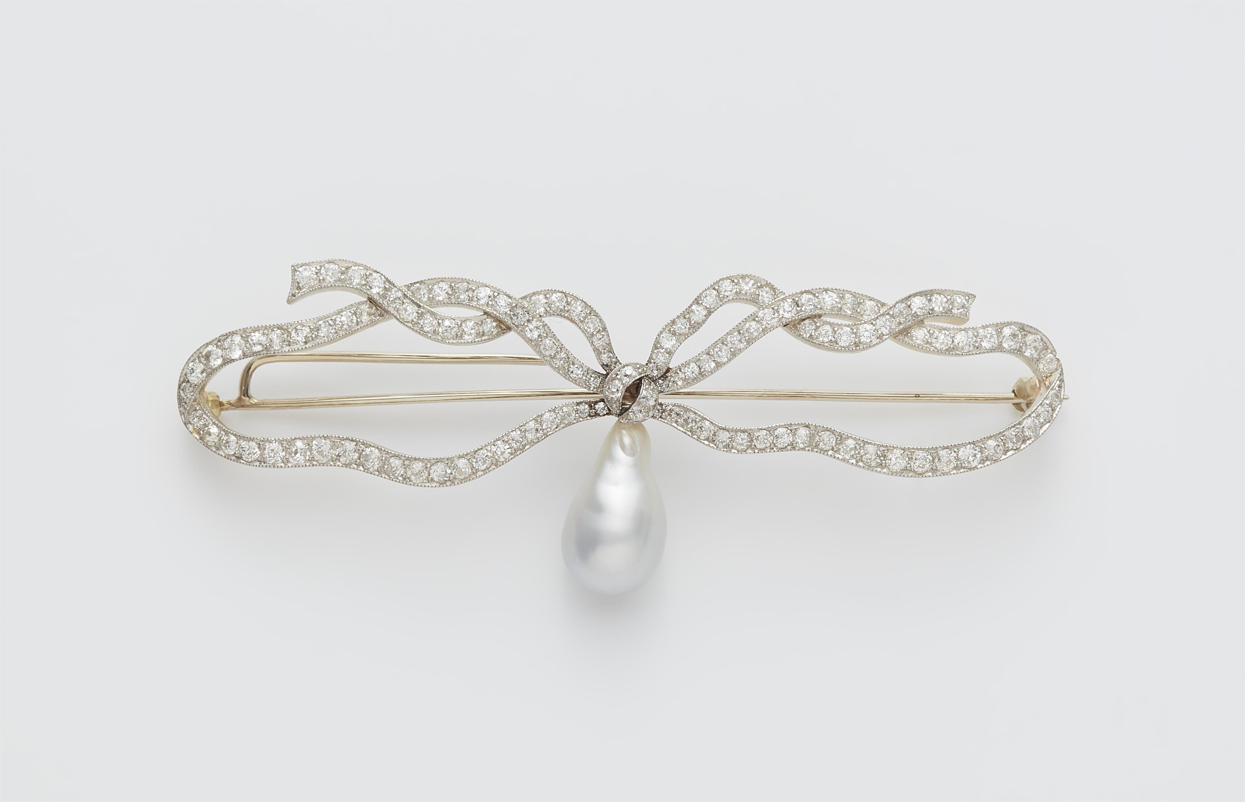 A 14k gold Belle Epoque diamond brooch with a later South Sea pearl droplet. - image-1