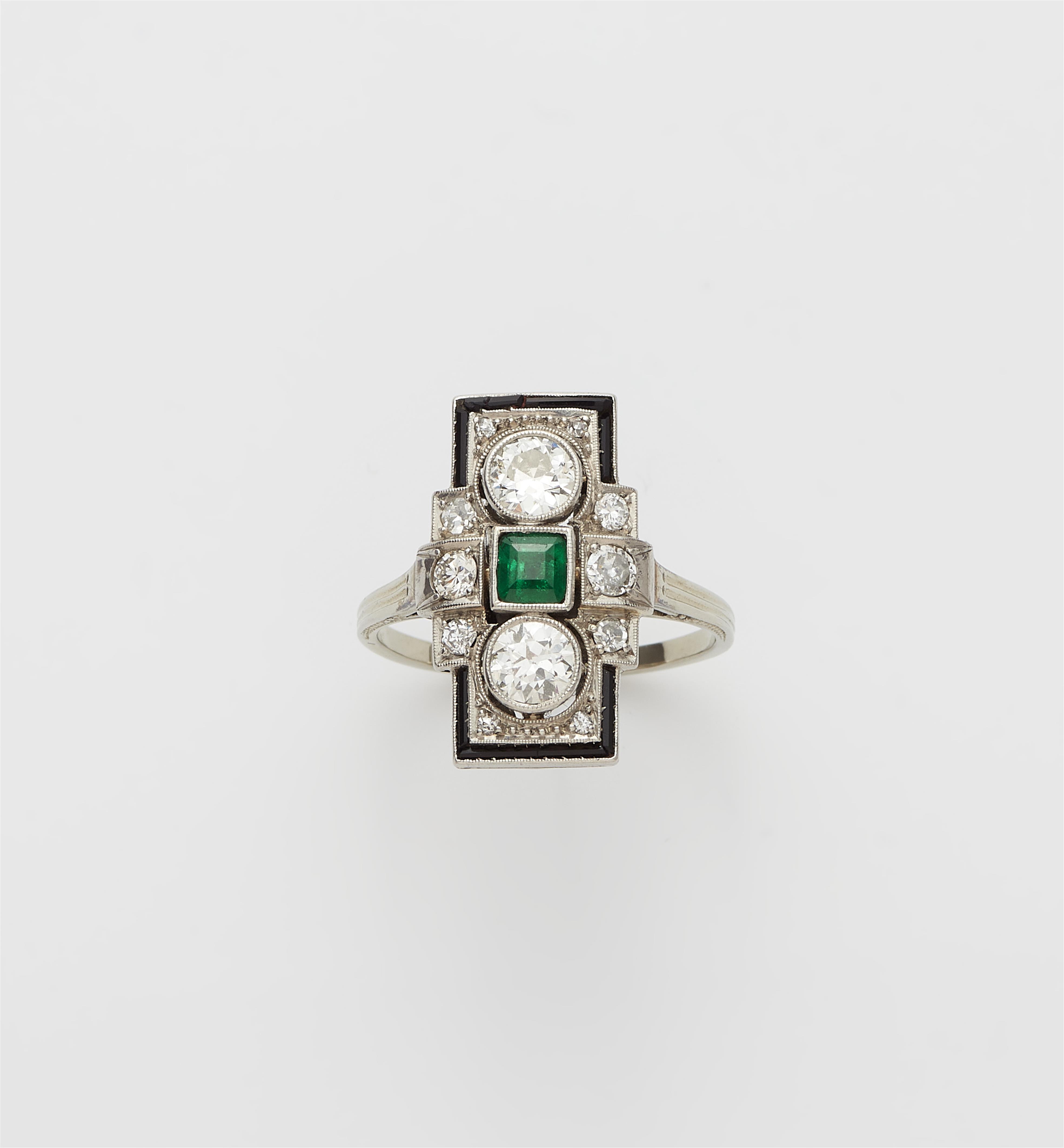 A German 18k gold diamond, enamel and Columbian emerald Art Déco ring. - image-1