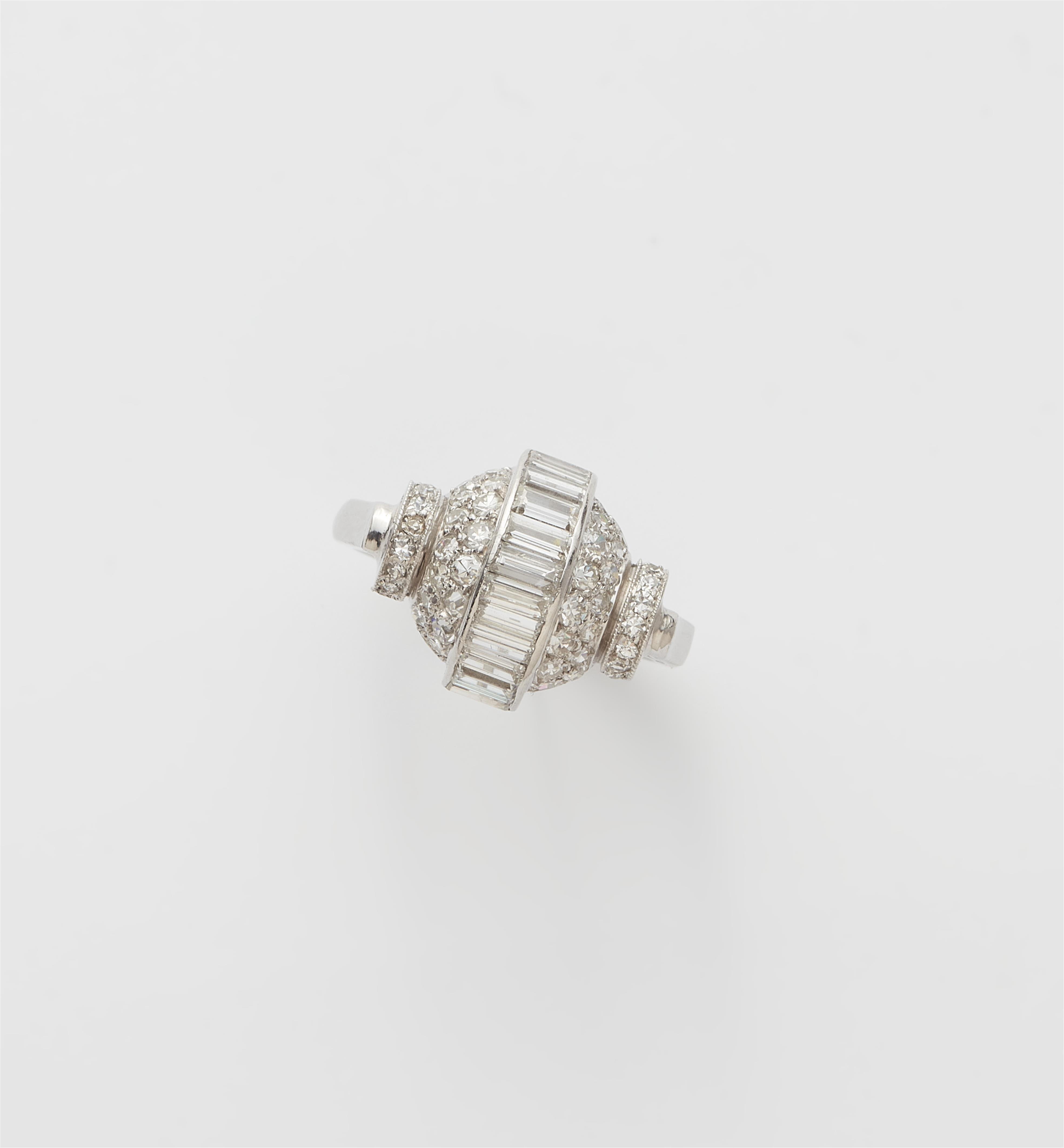 A domed platinum and diamond Art Déco ring. - image-1