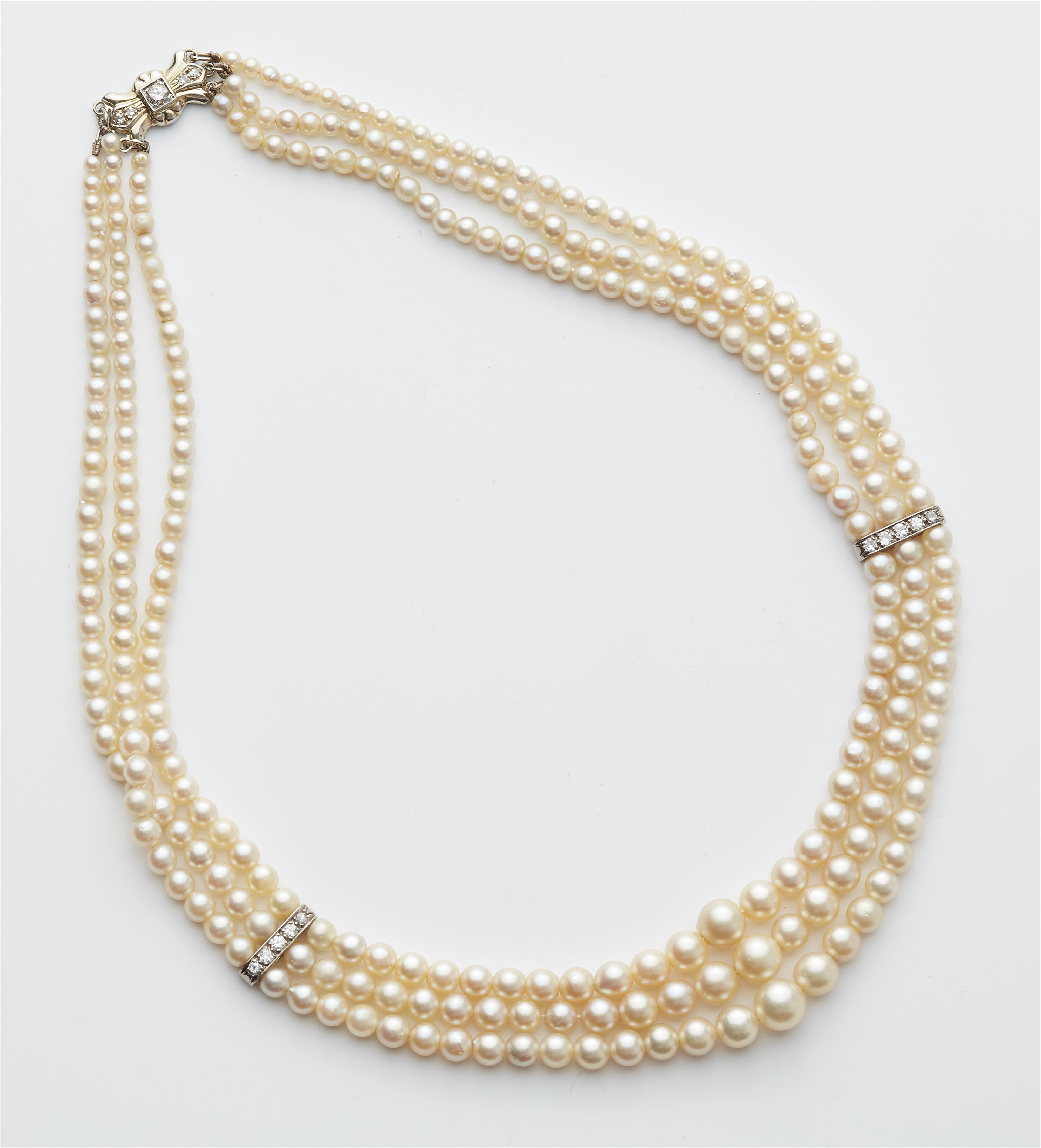 A French Art Déco 18k gold cultured pearl and diamond garland necklace. - image-1