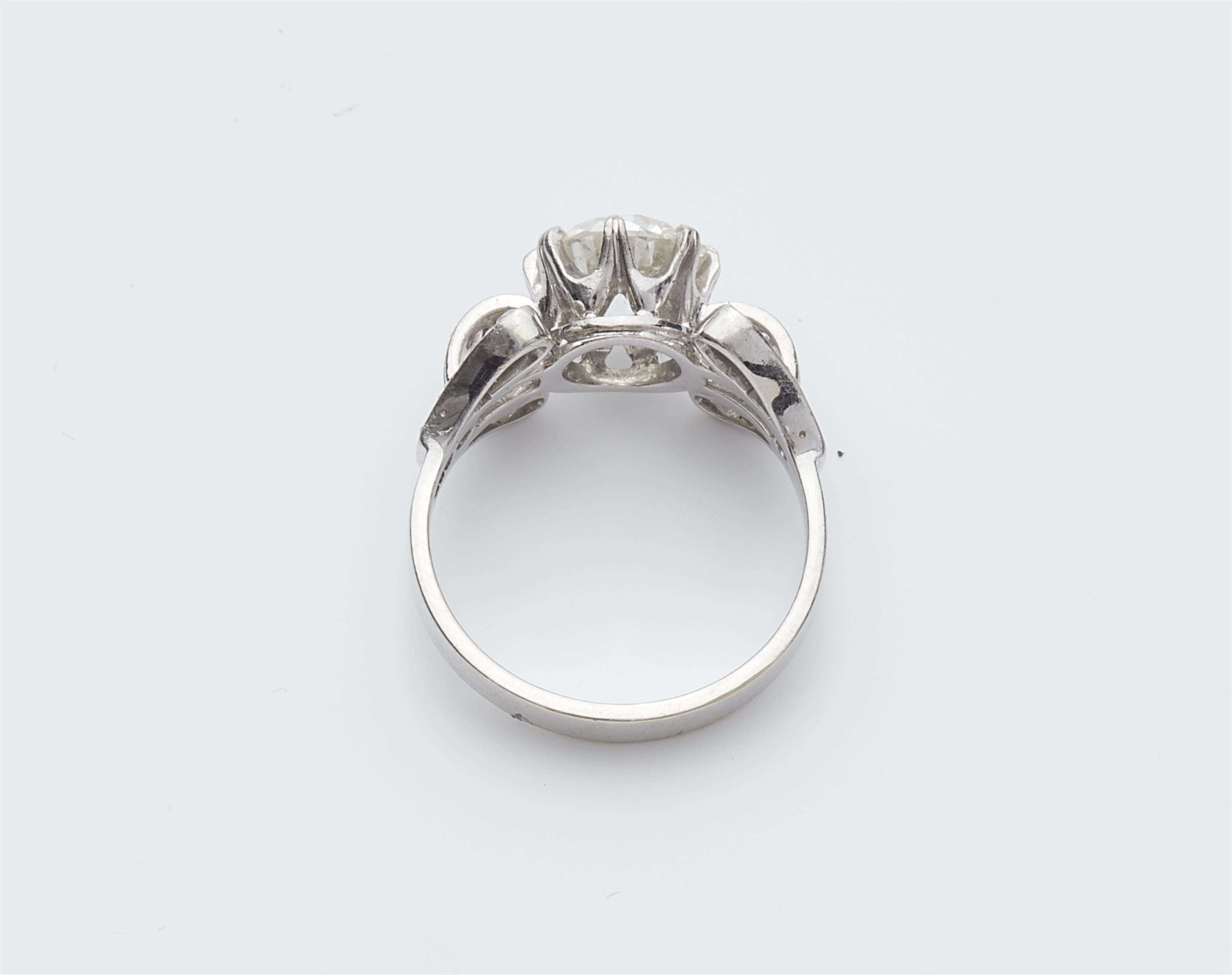 A retro 14k white gold diamond solitaire ring - image-2