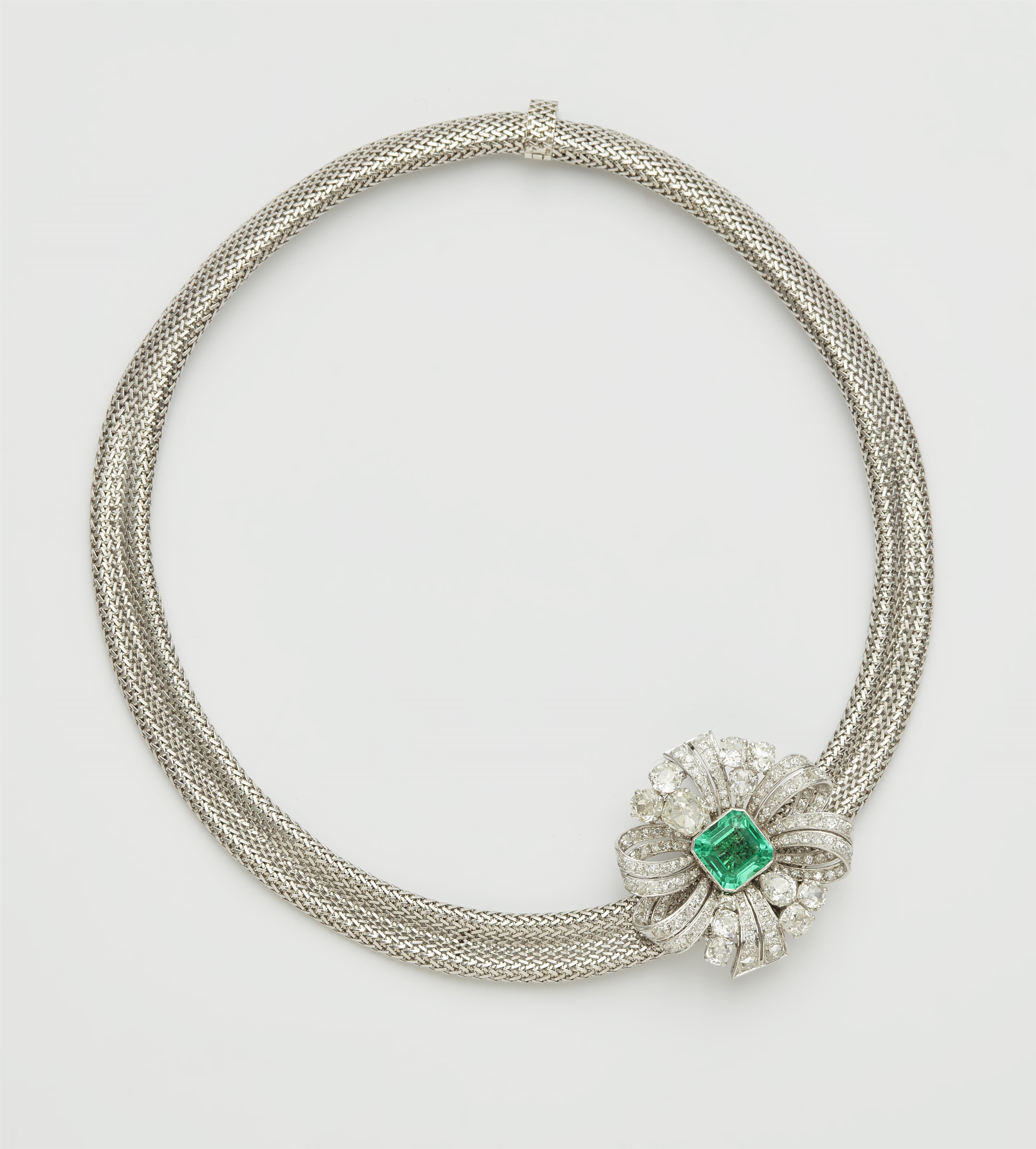 An 18k white gold diamond rosette brooch with a fine Columbian emerald and milanaise meshwork necklace. - image-3