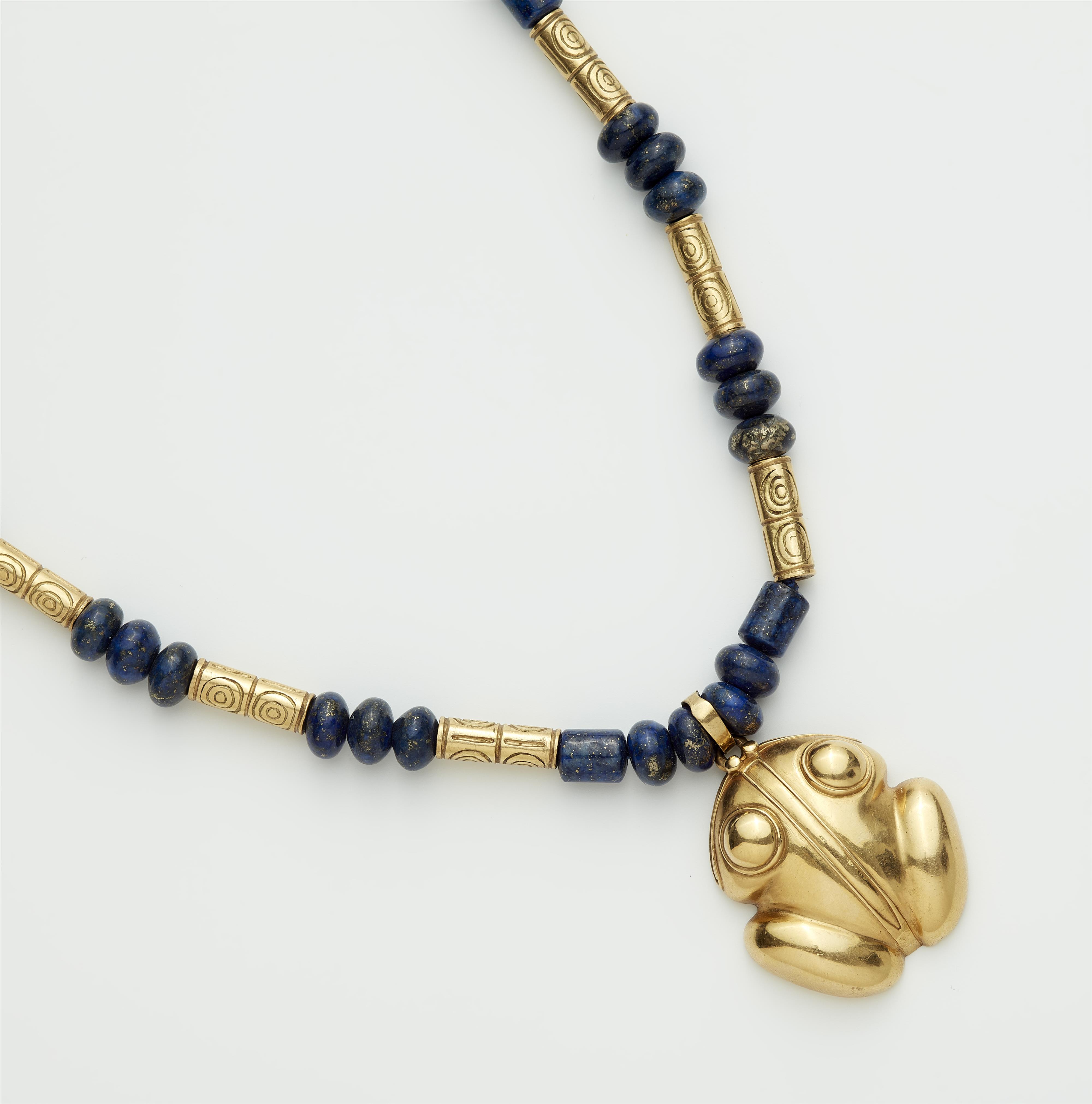 A 20k gold lapis lazuli necklace with a frog pendant in Pre-Columbian style. - image-1