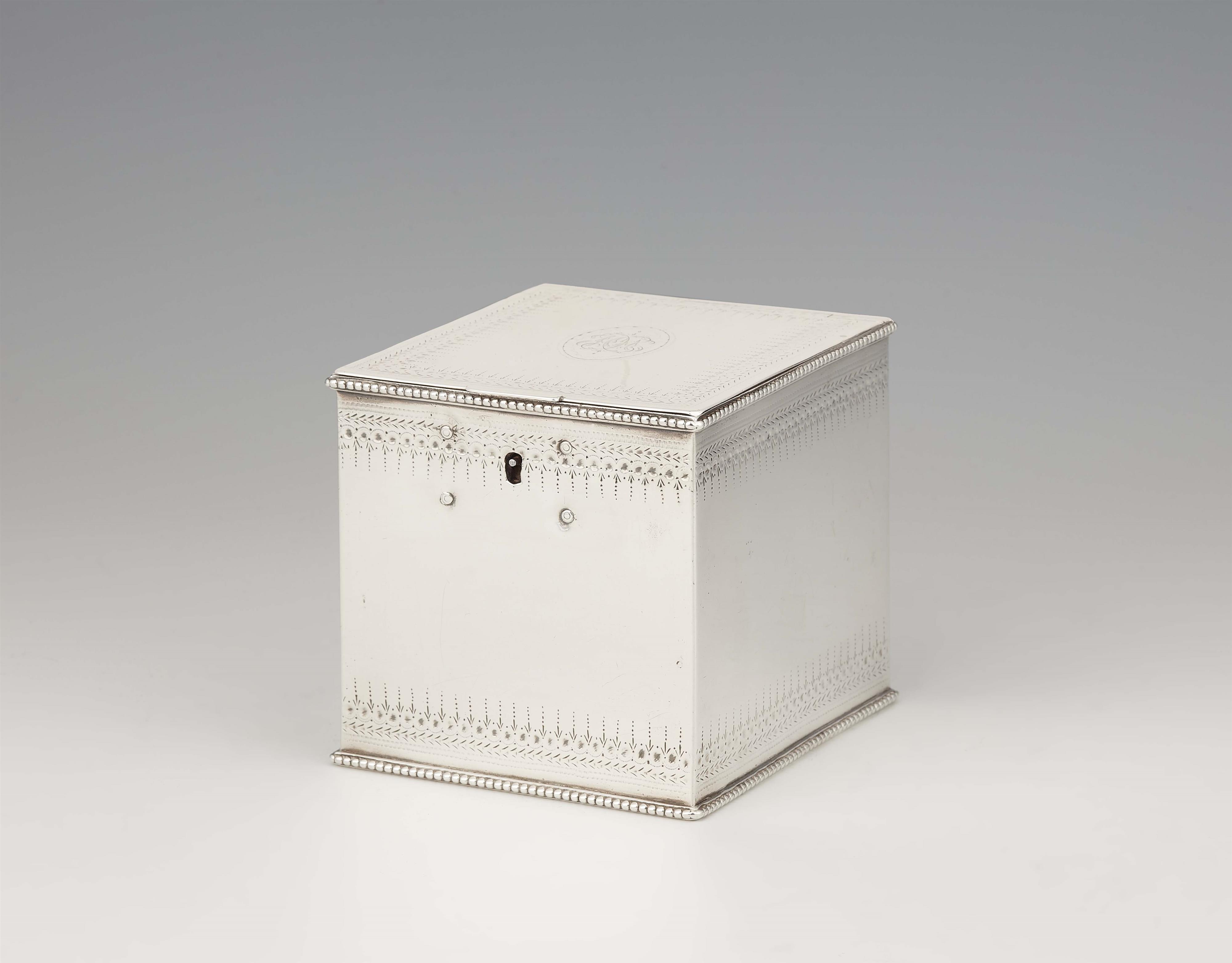 A George III silver tea caddy - image-1