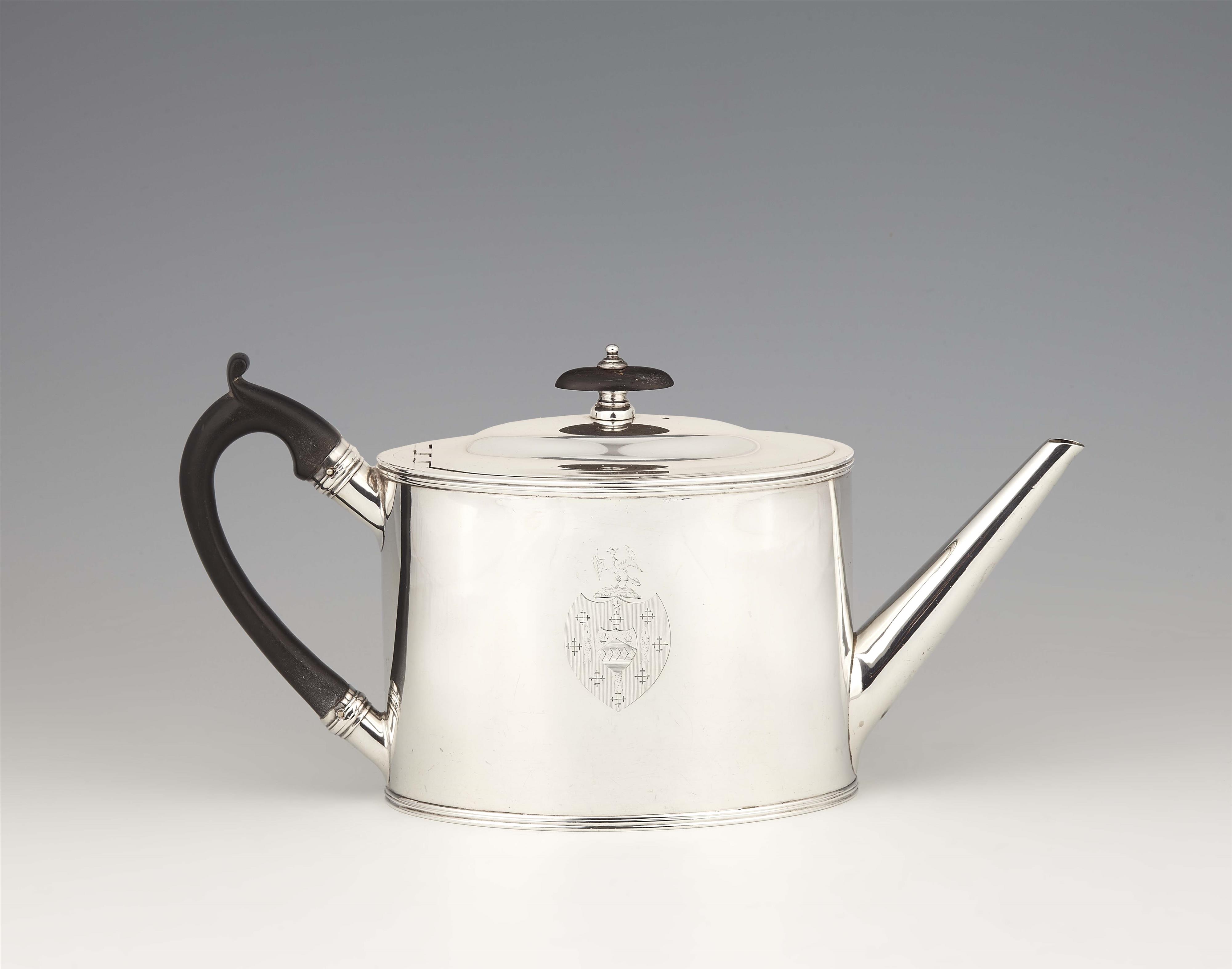 A George III silver teapot - image-1