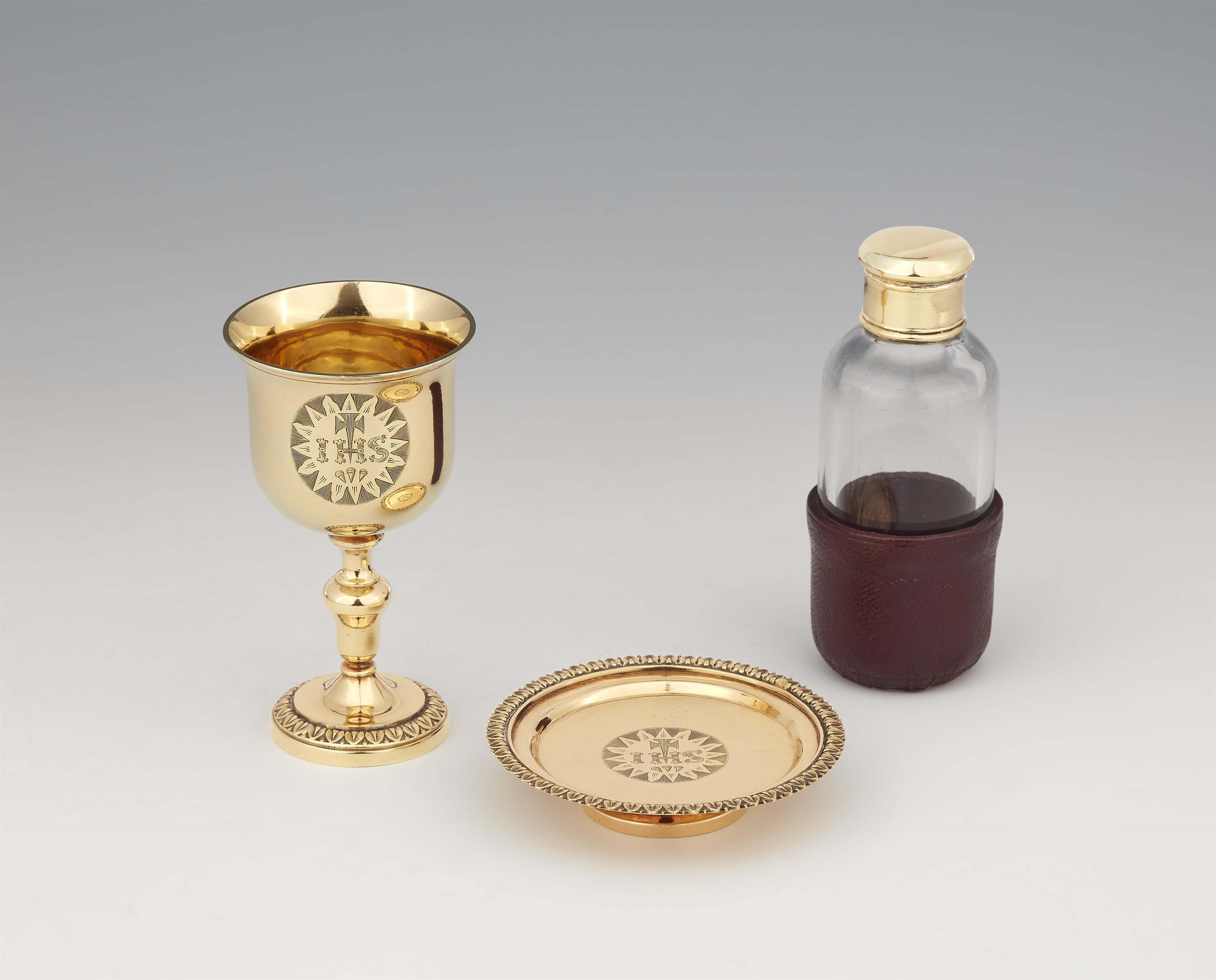 A small George IV silver gilt communion garniture - image-1