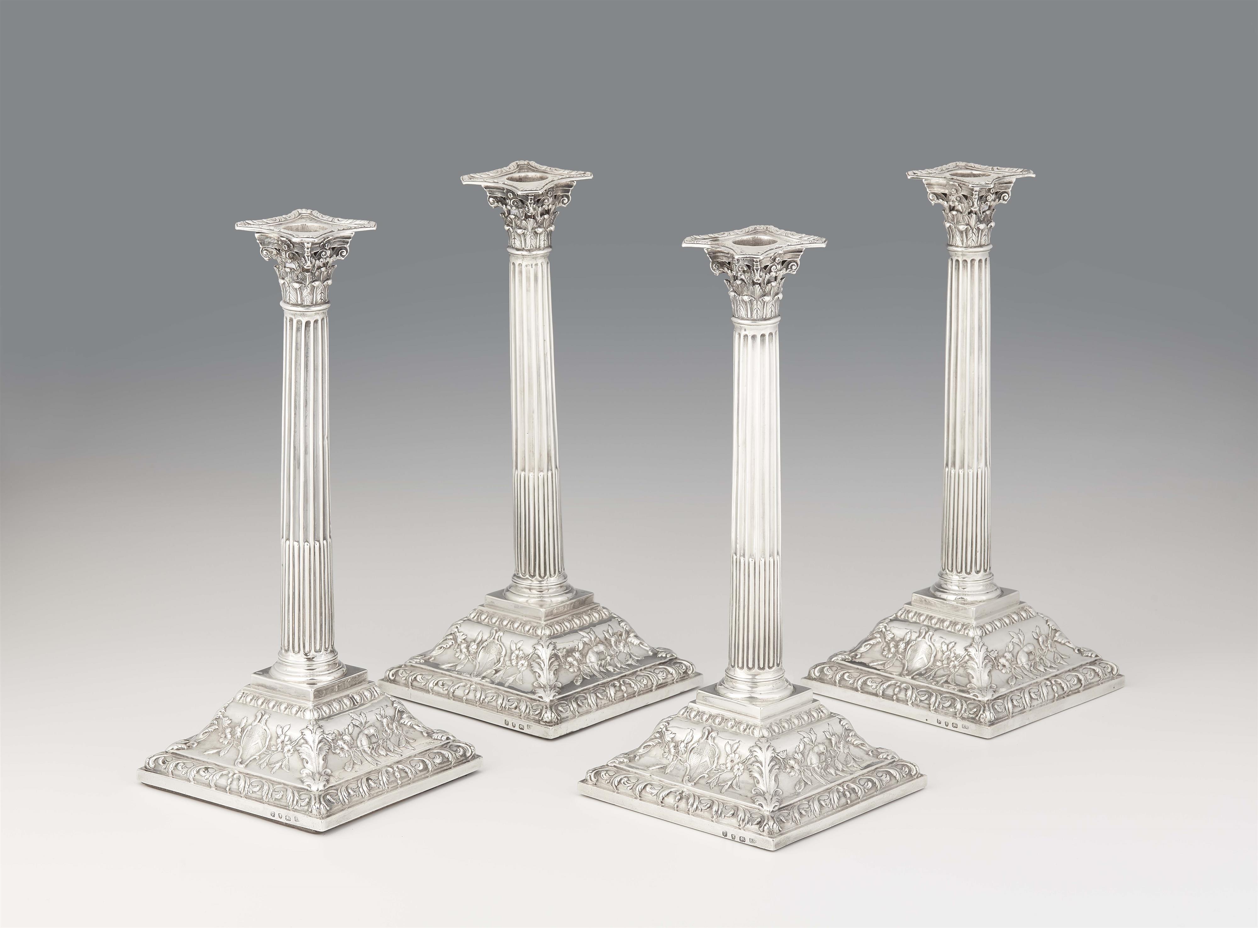 Four George III silver candlesticks - image-1