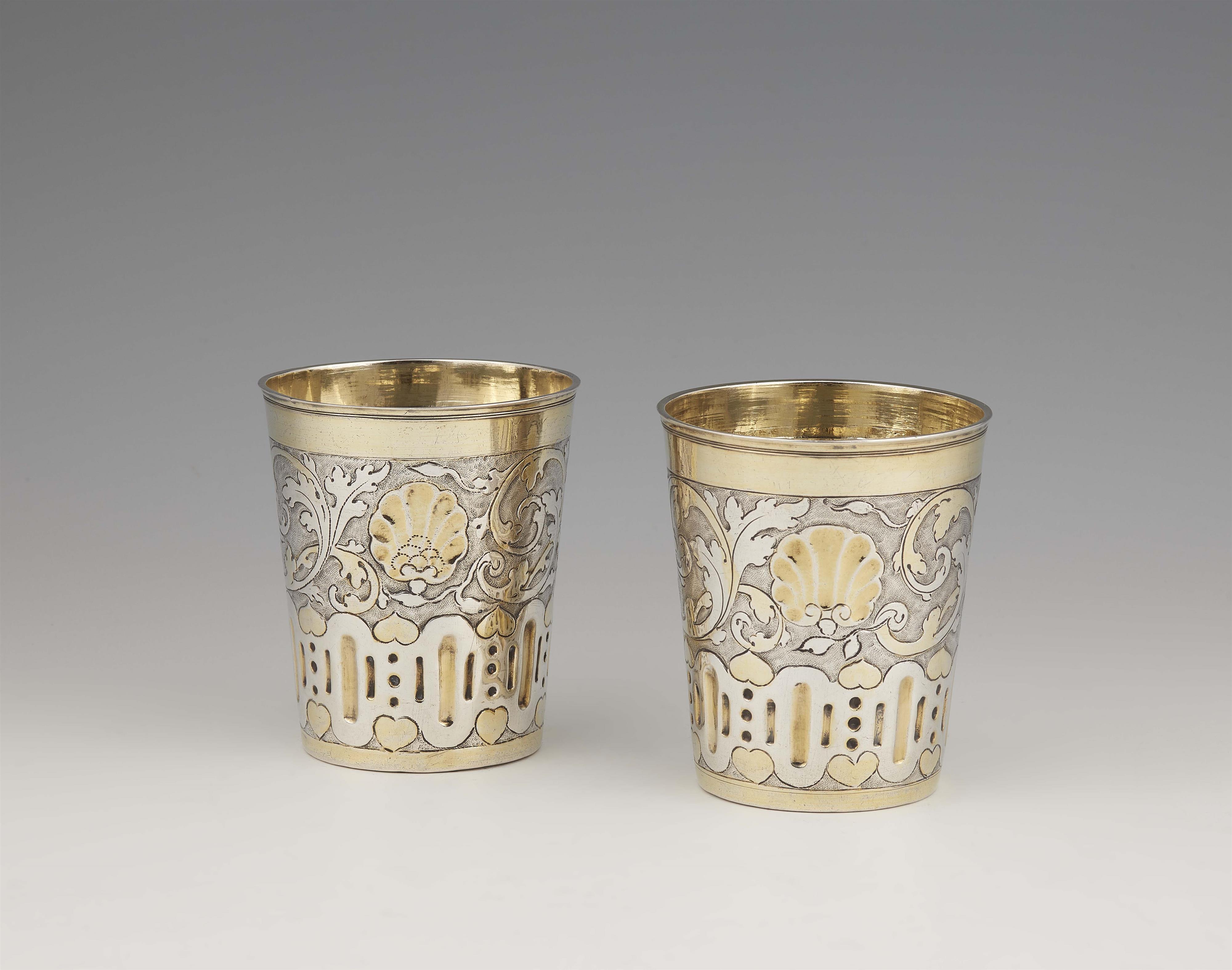 A pair of Breslau silver beakers - image-1