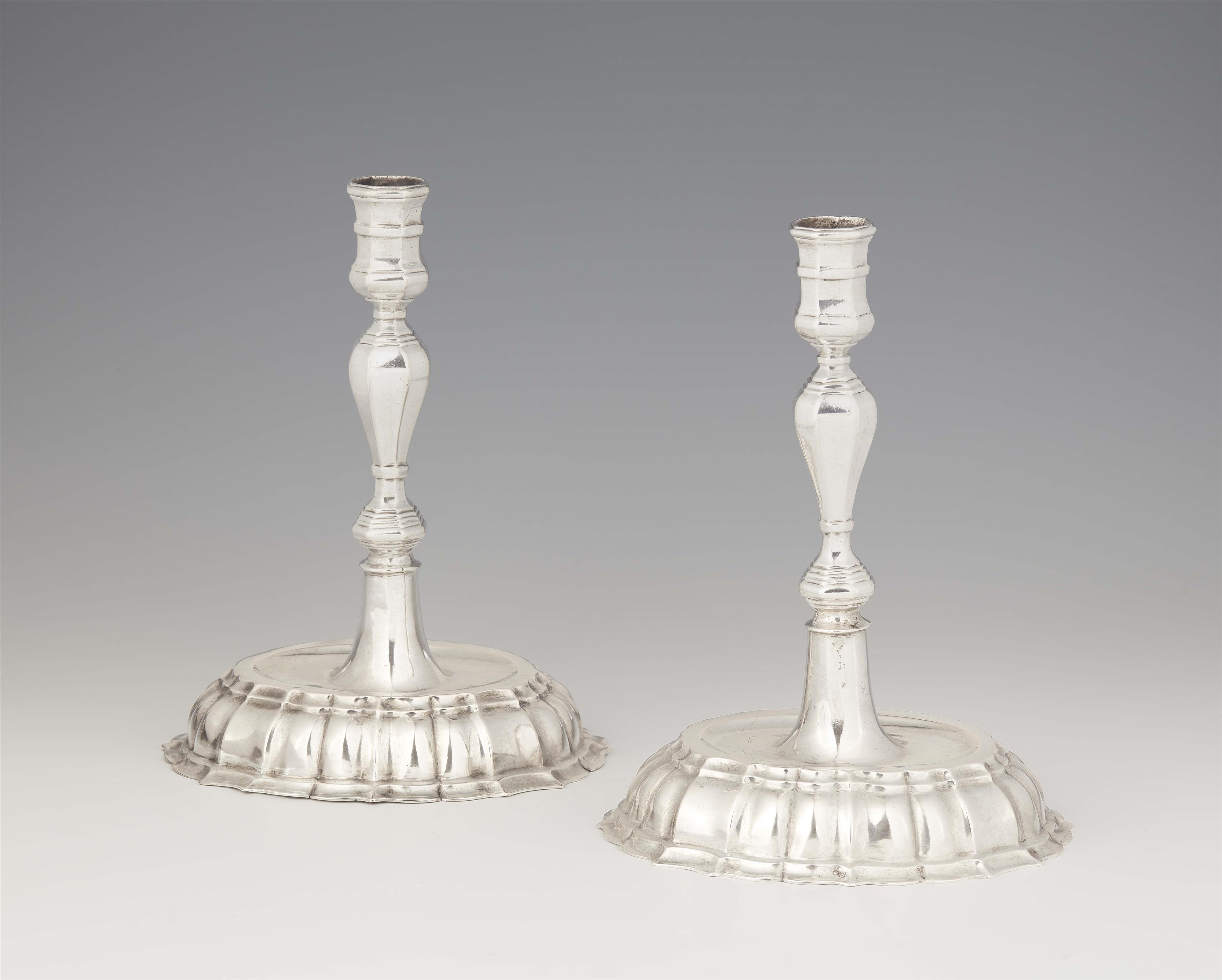 A pair of Breslau silver candlesticks - image-1