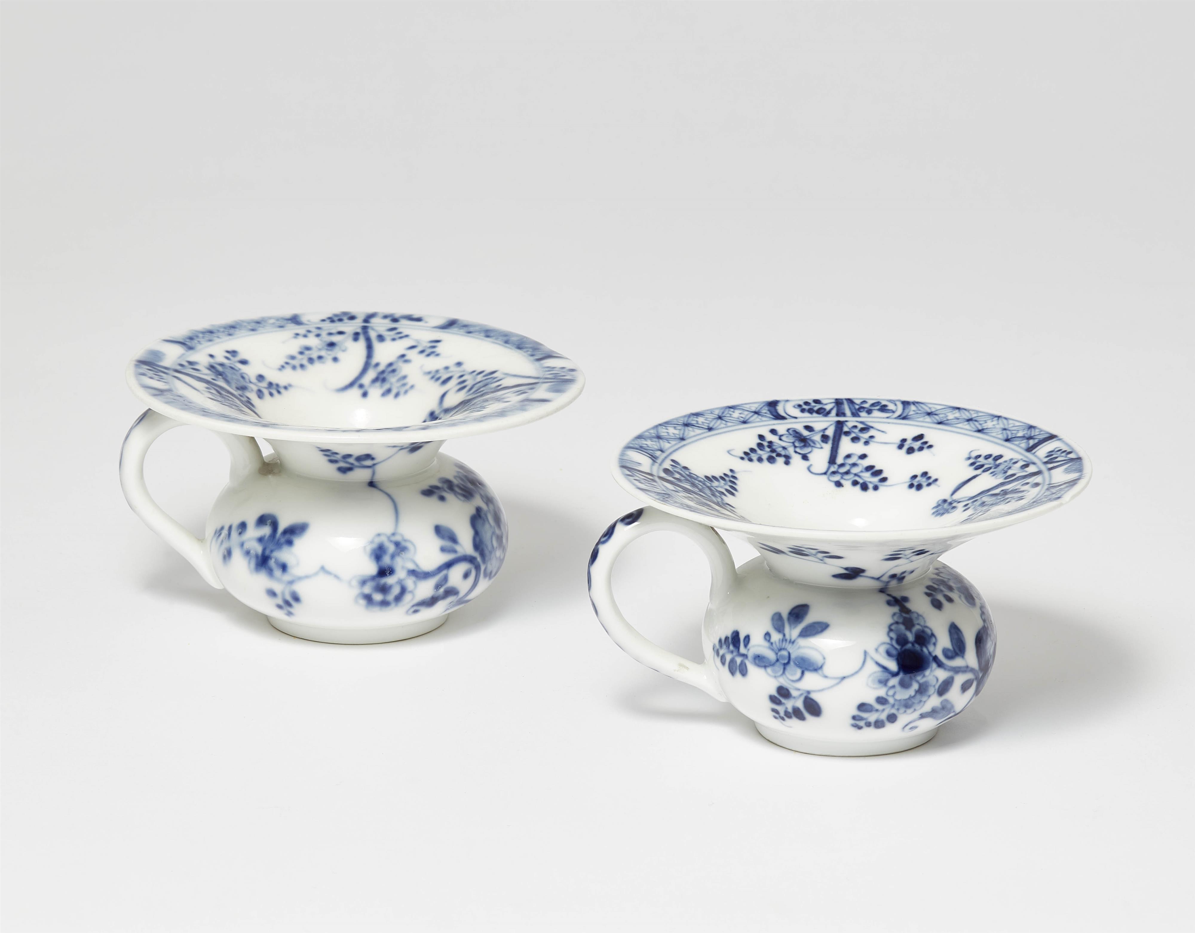 A pair of Meissen porcelain spitoons with Oriental flowers - image-1