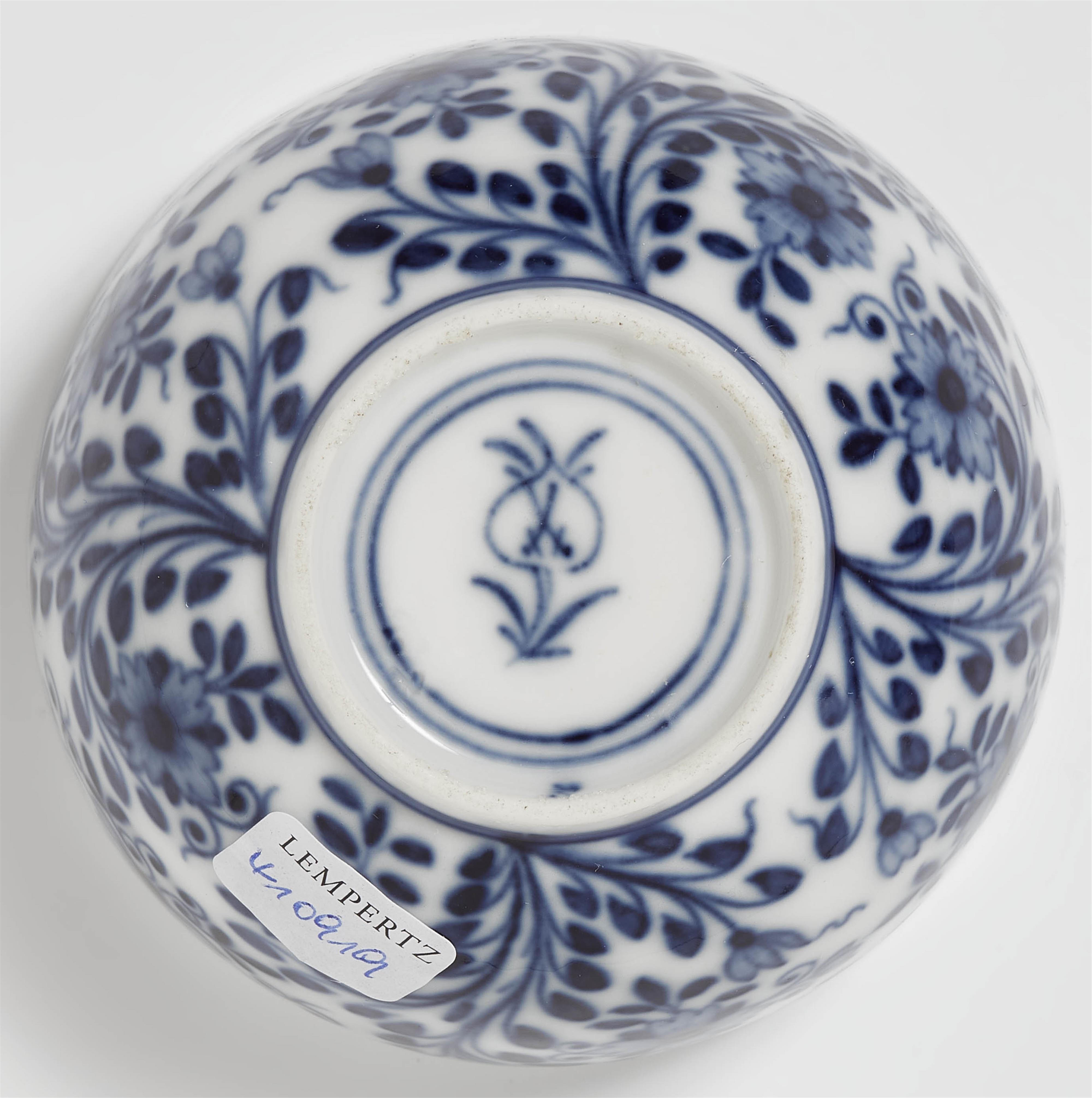 A Meissen porcelain tea bowl with a flower mark - image-3