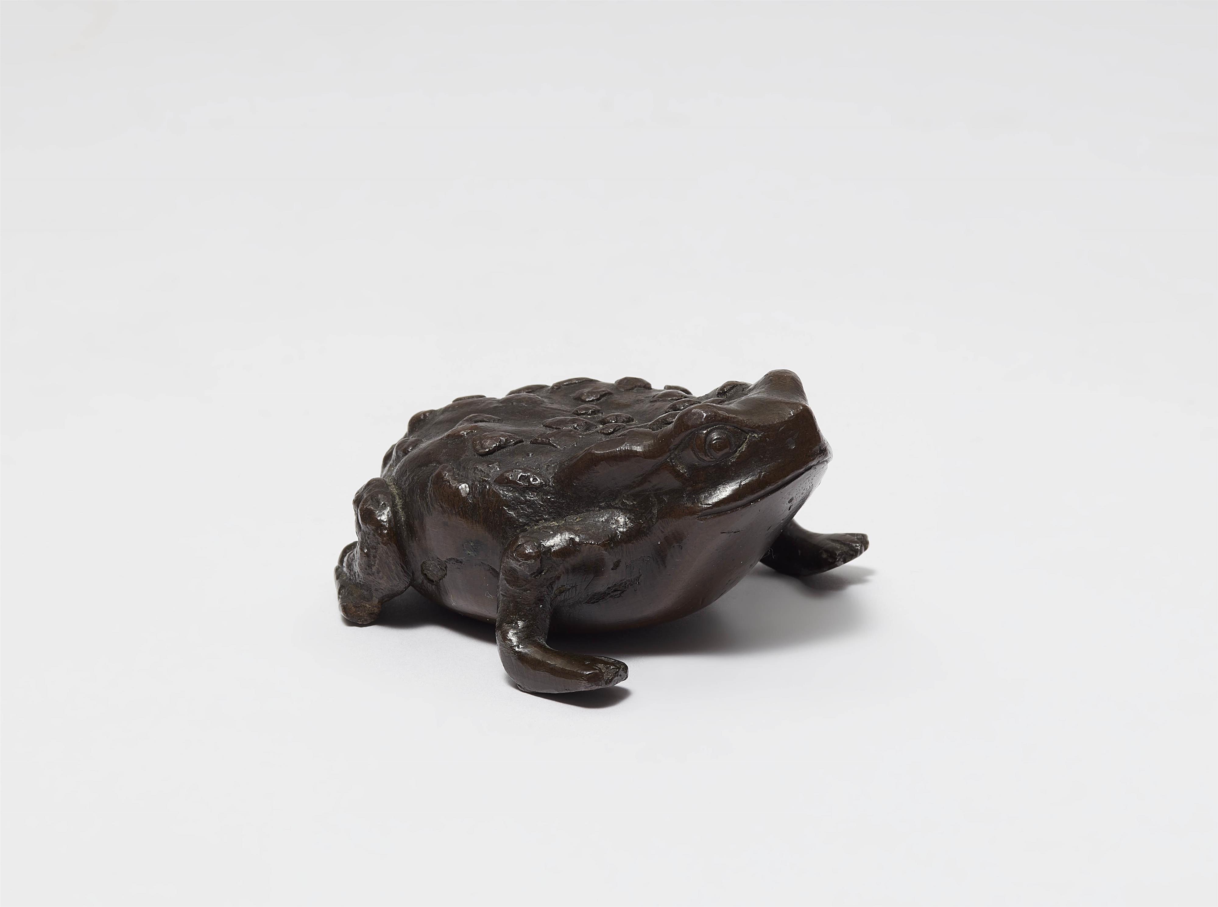 A cast bronze toad - image-1