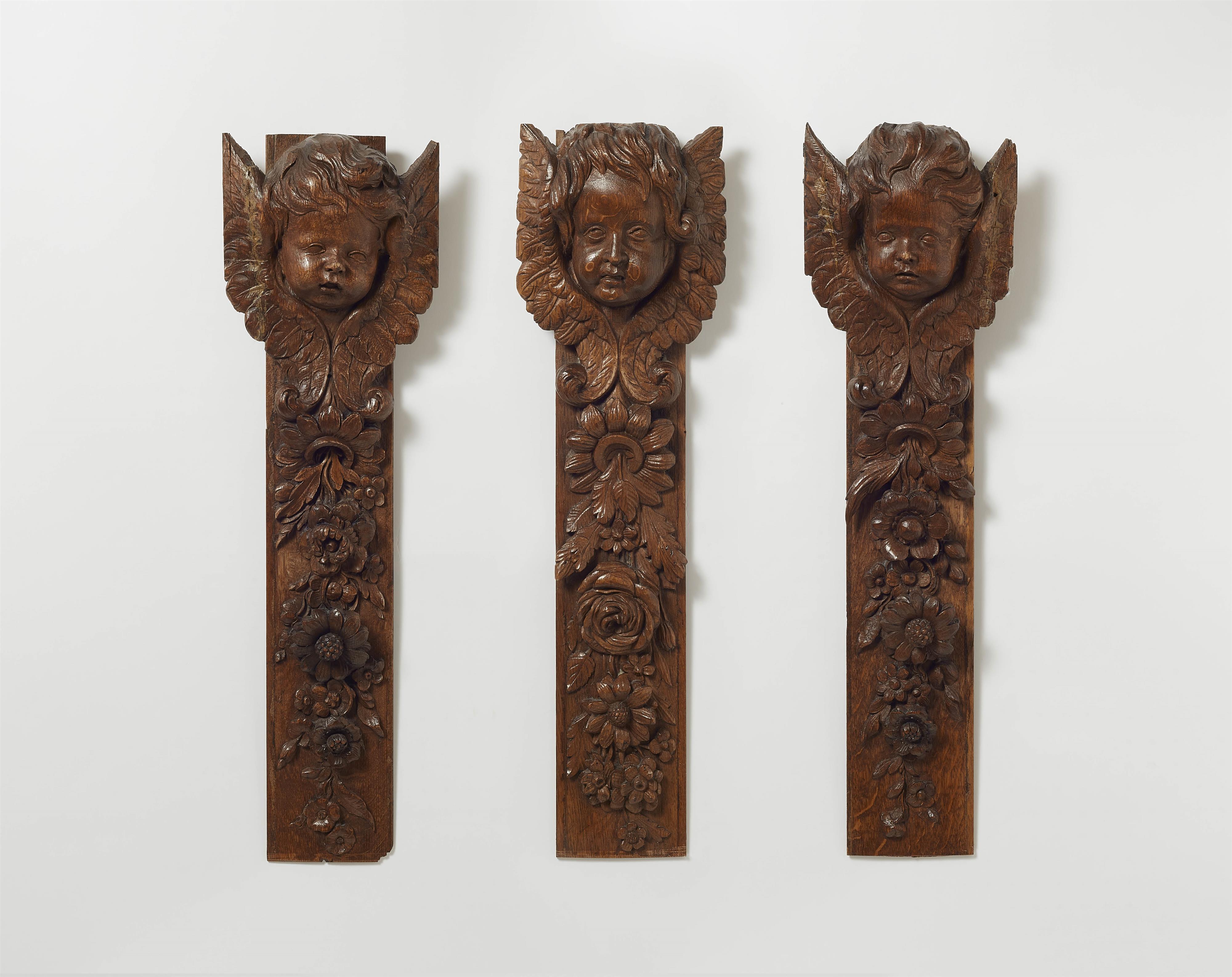 Three decorative oak panels with angels' heads - image-1