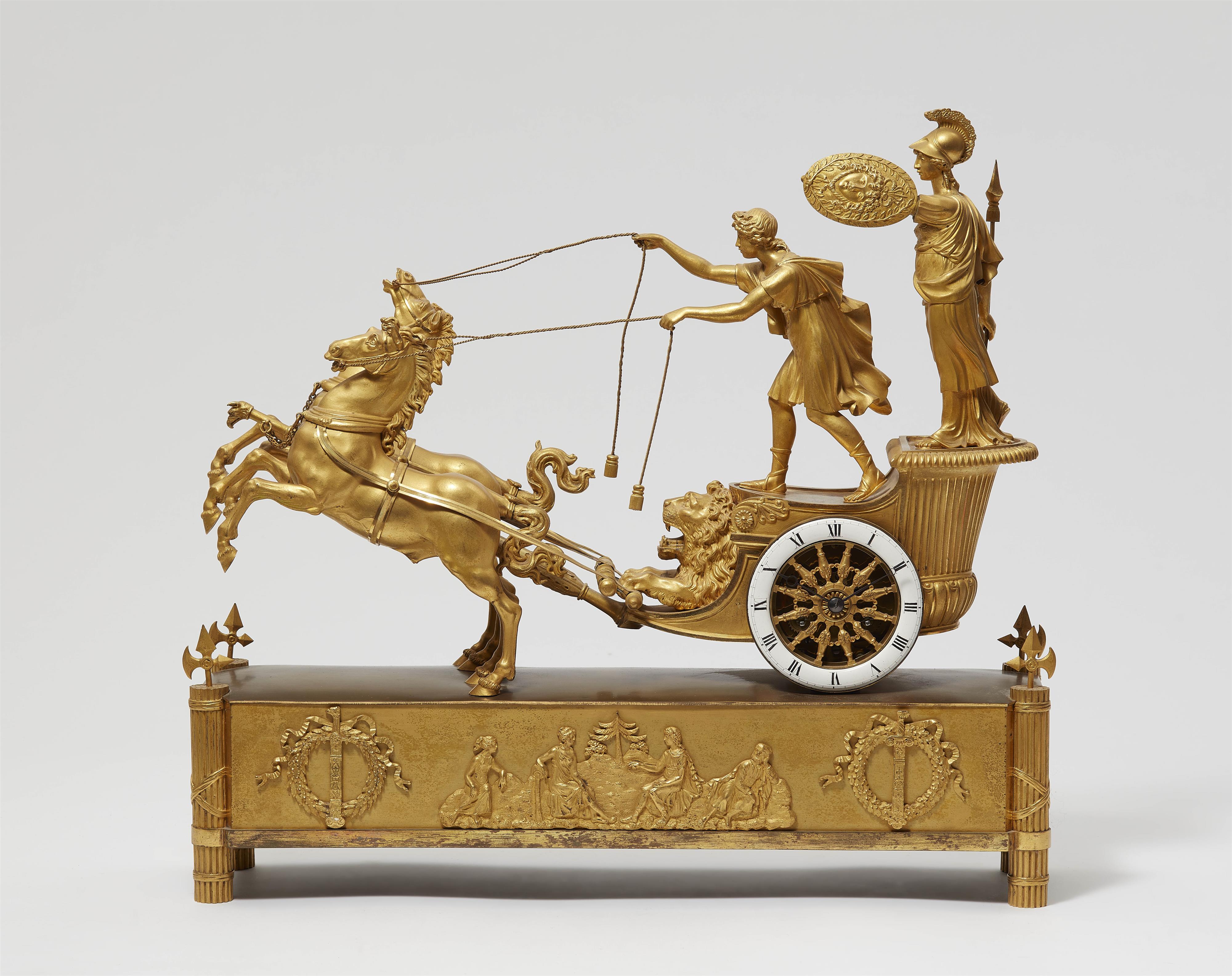 An ormolu pendulum clock with a chariot - image-1
