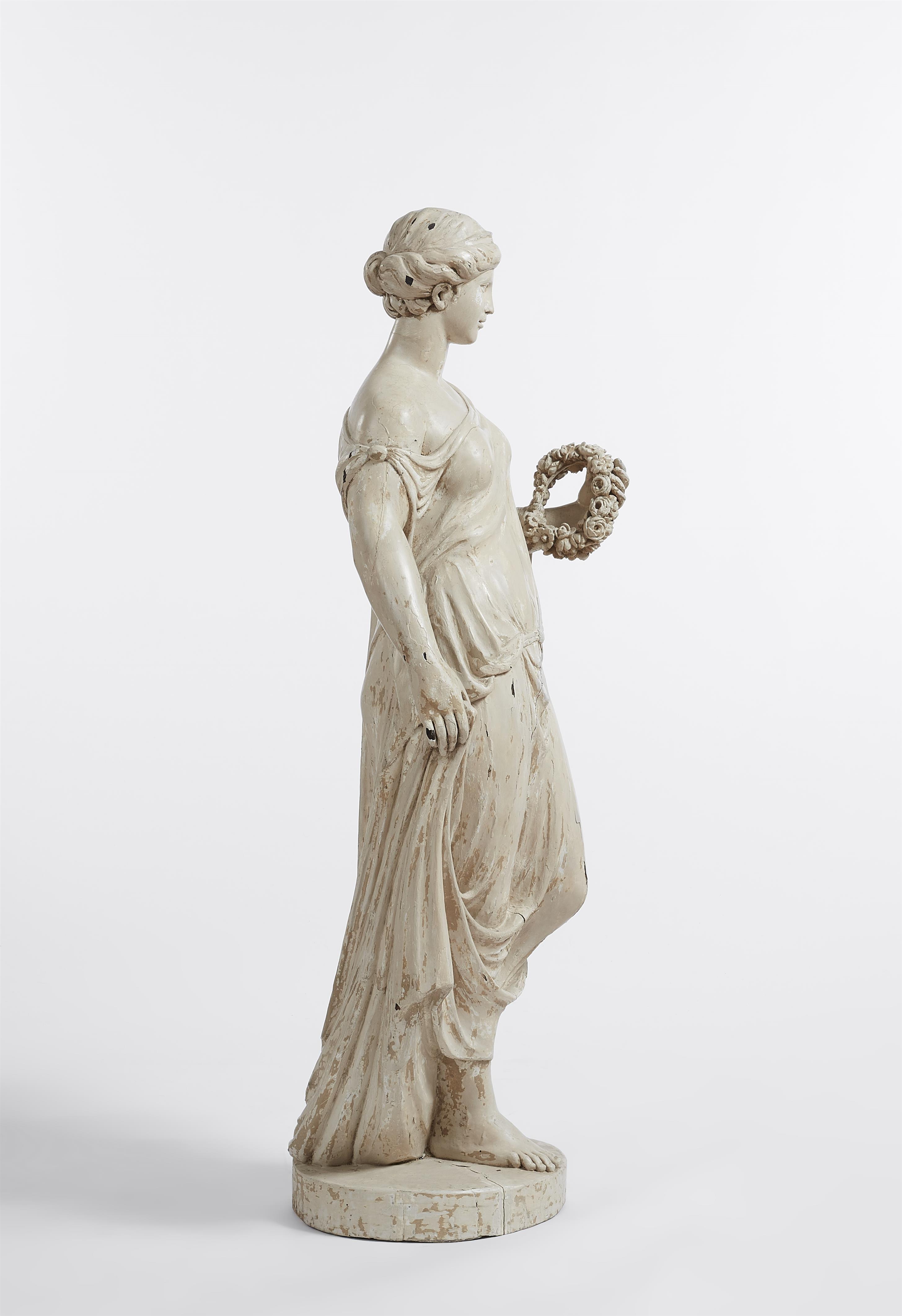 A carved softwood figure of a lady with a wreath / Flora - image-3