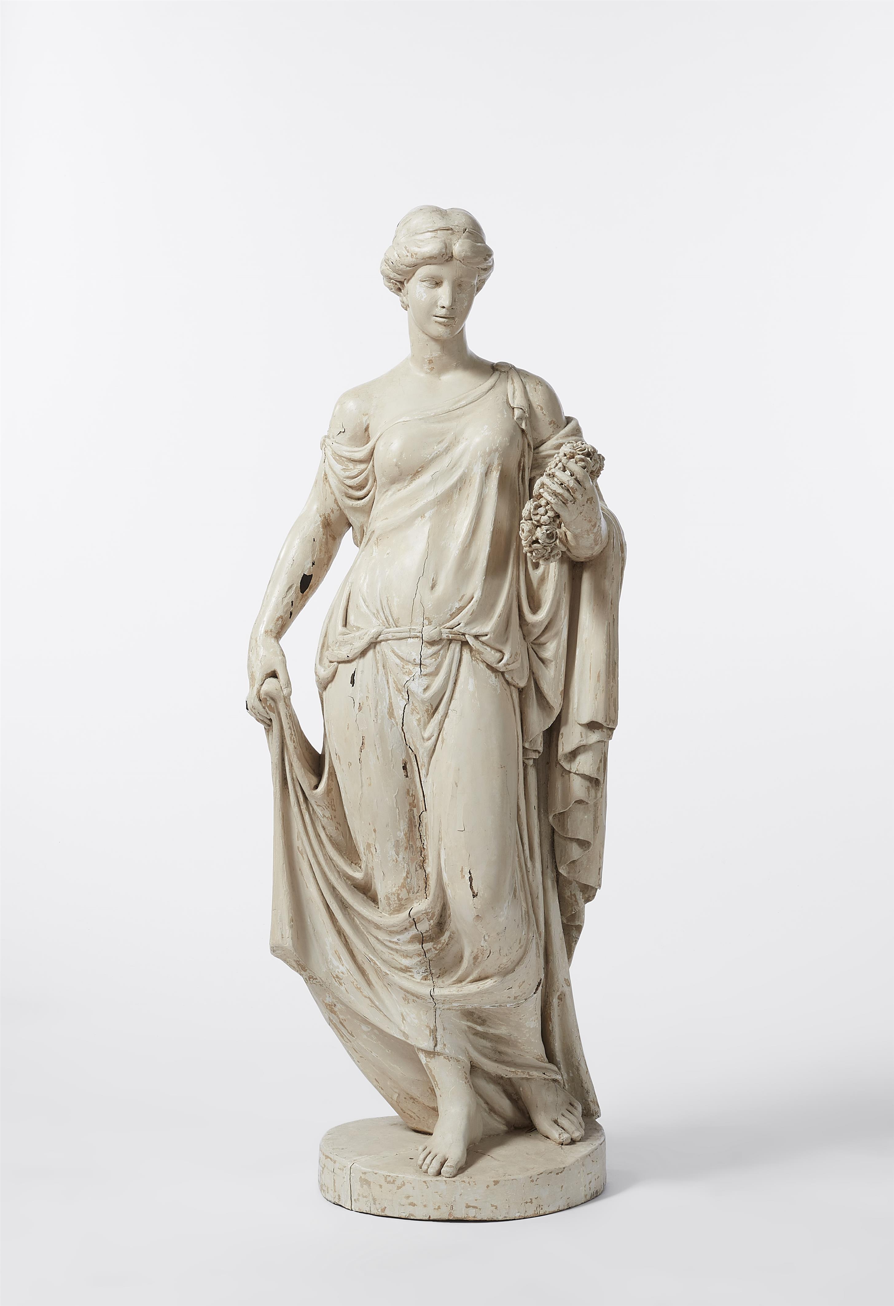 A carved softwood figure of a lady with a wreath / Flora - image-1