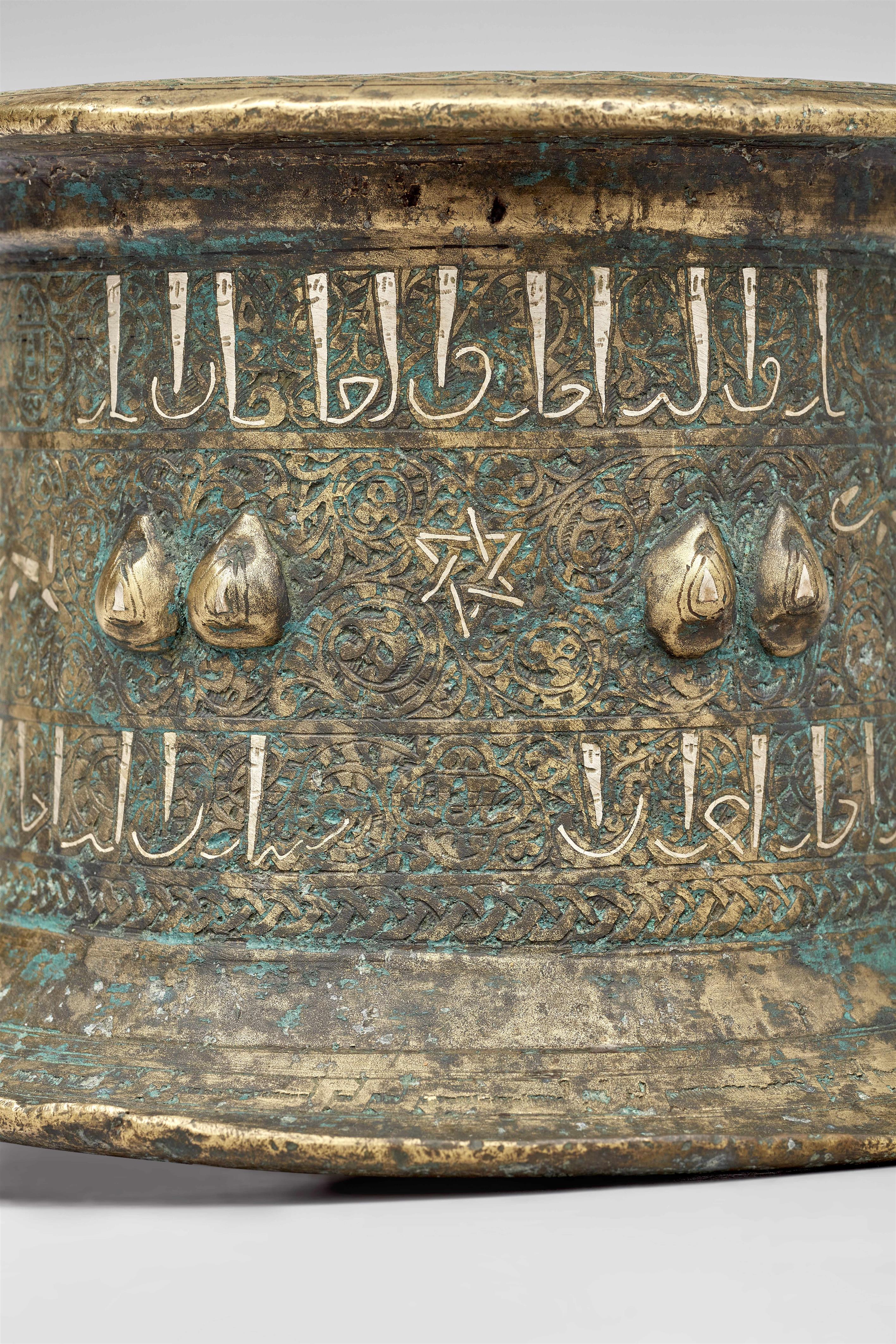 An Islamic mortar with lotus bud reliefs - image-5