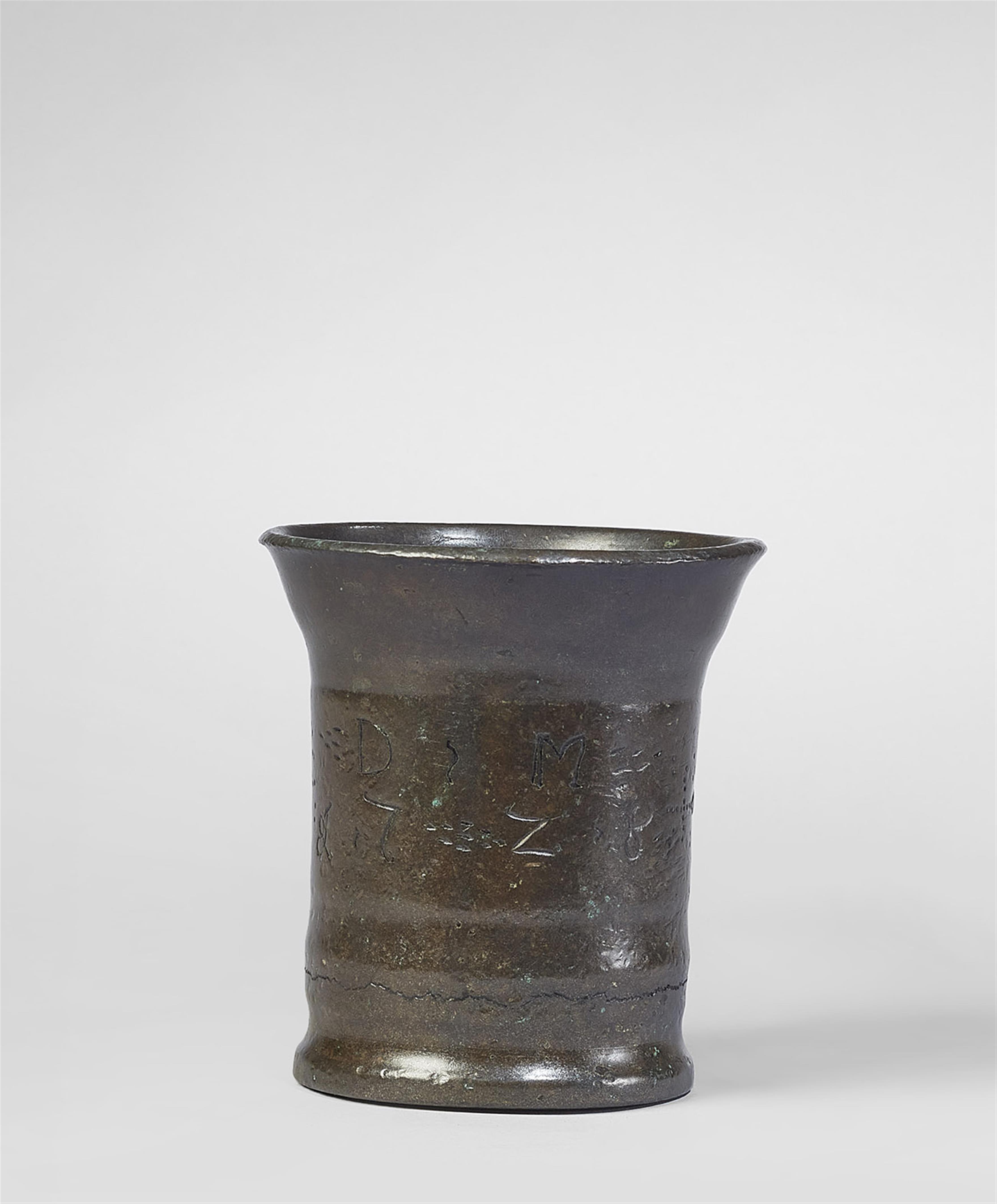 A small single-handled mortar dated 1728 - image-2