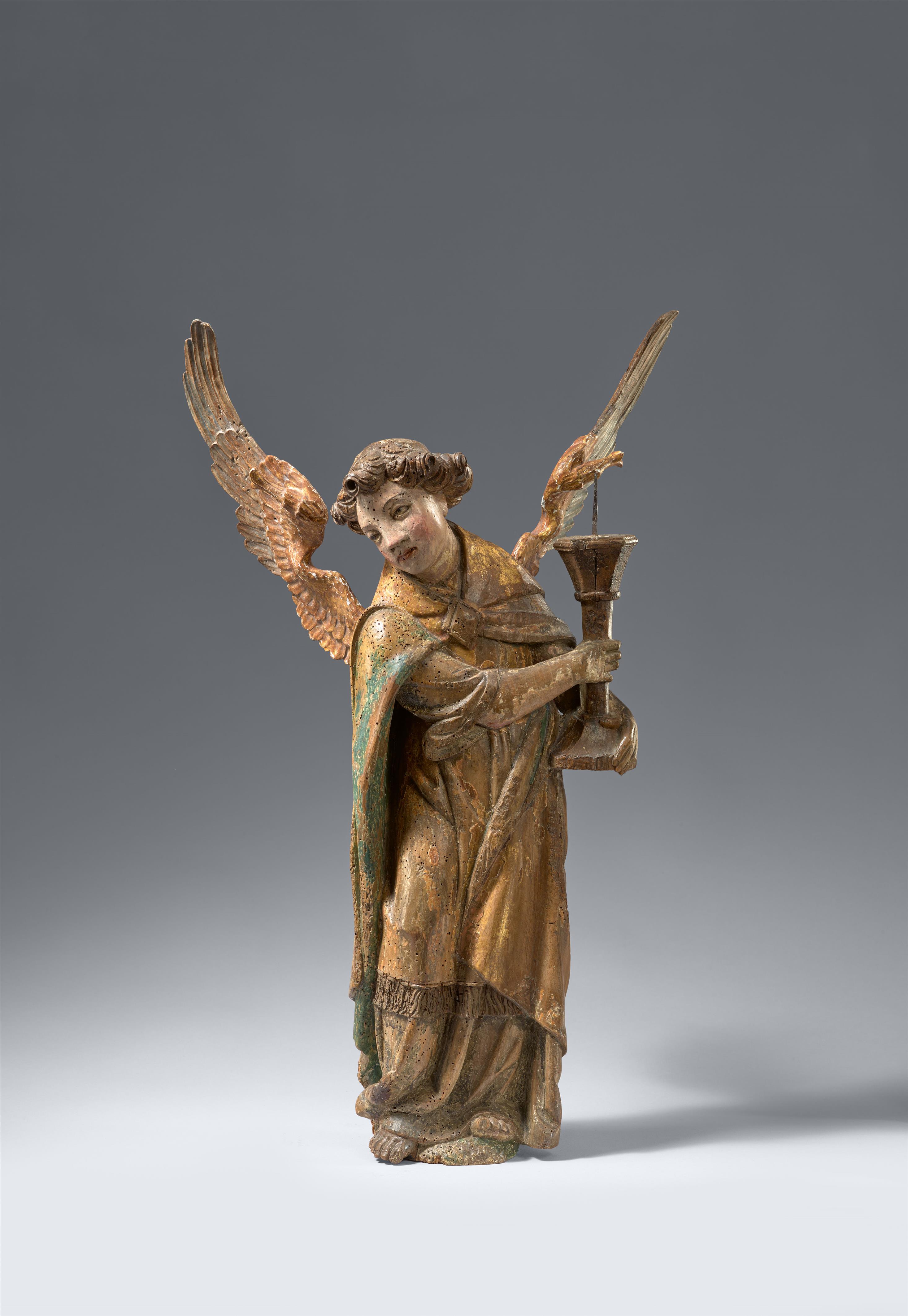 Probably Franconia around 1500 - A carved wooden angel with a candlestick, presumably Franconia, around 1500 - image-1