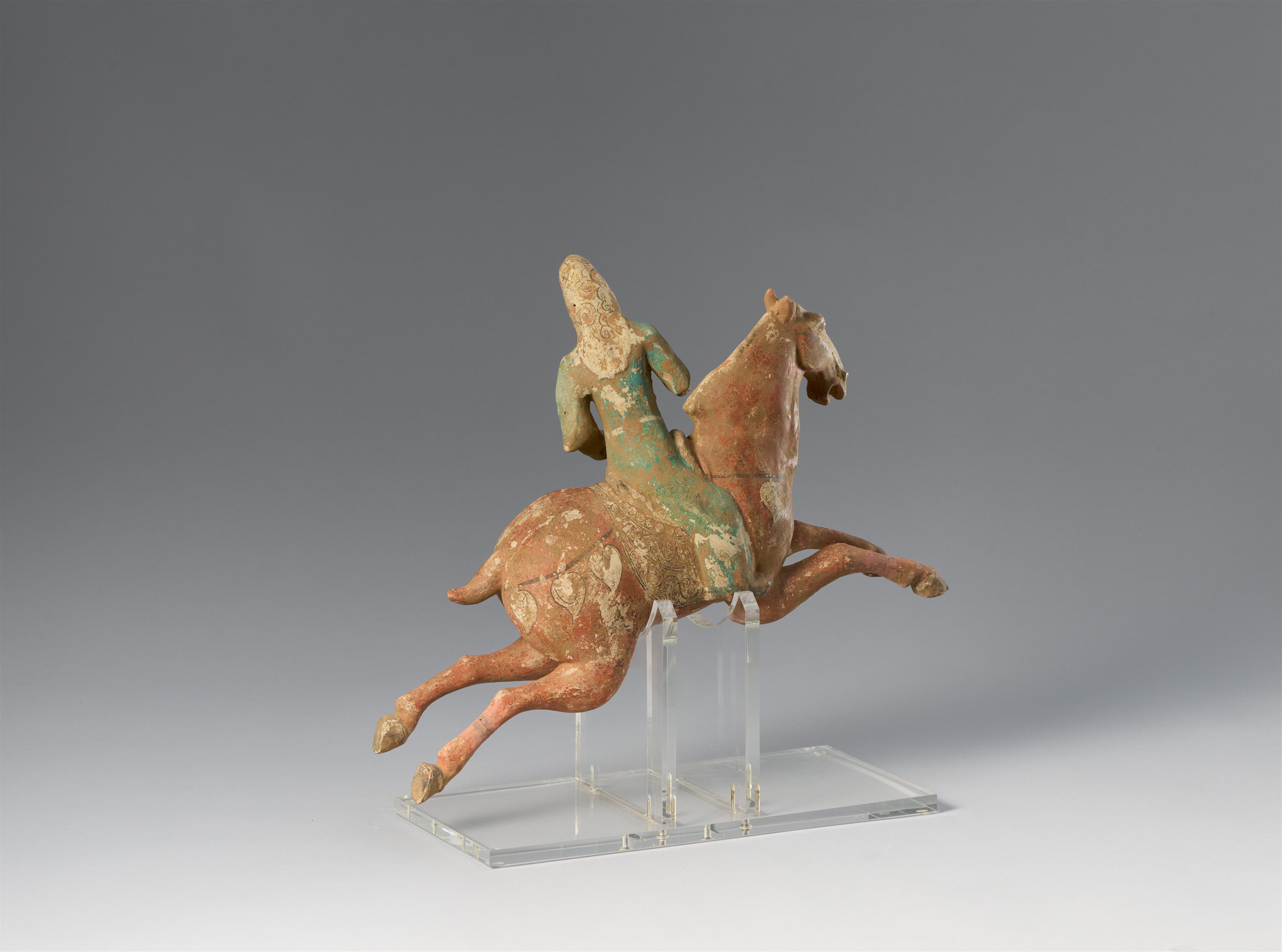 A pottery figure of a polo player. Tang dynasty (618–907) - image-2