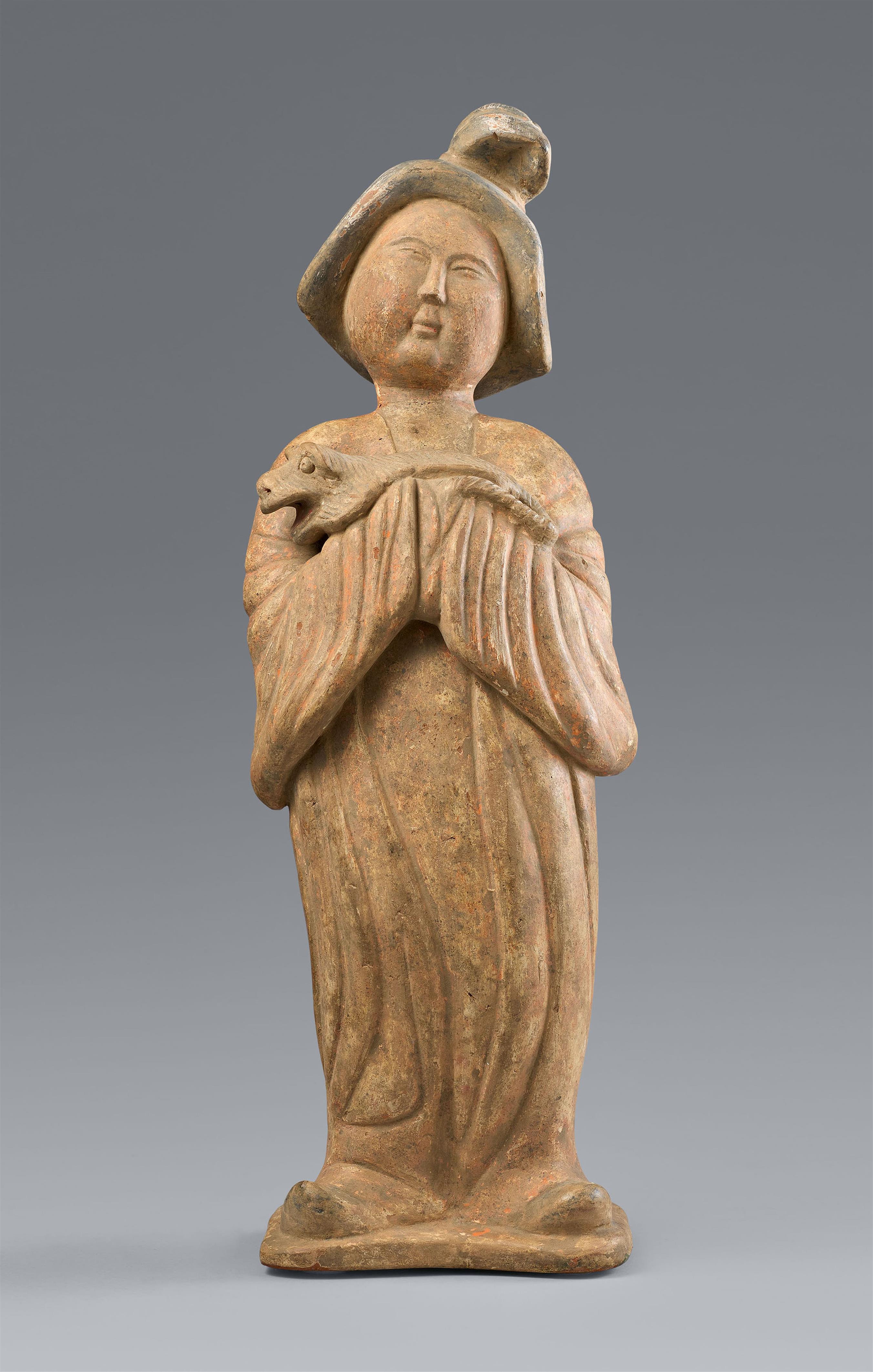 A figure of a court lady with a dog. Tang dynasty (618–907) - image-1