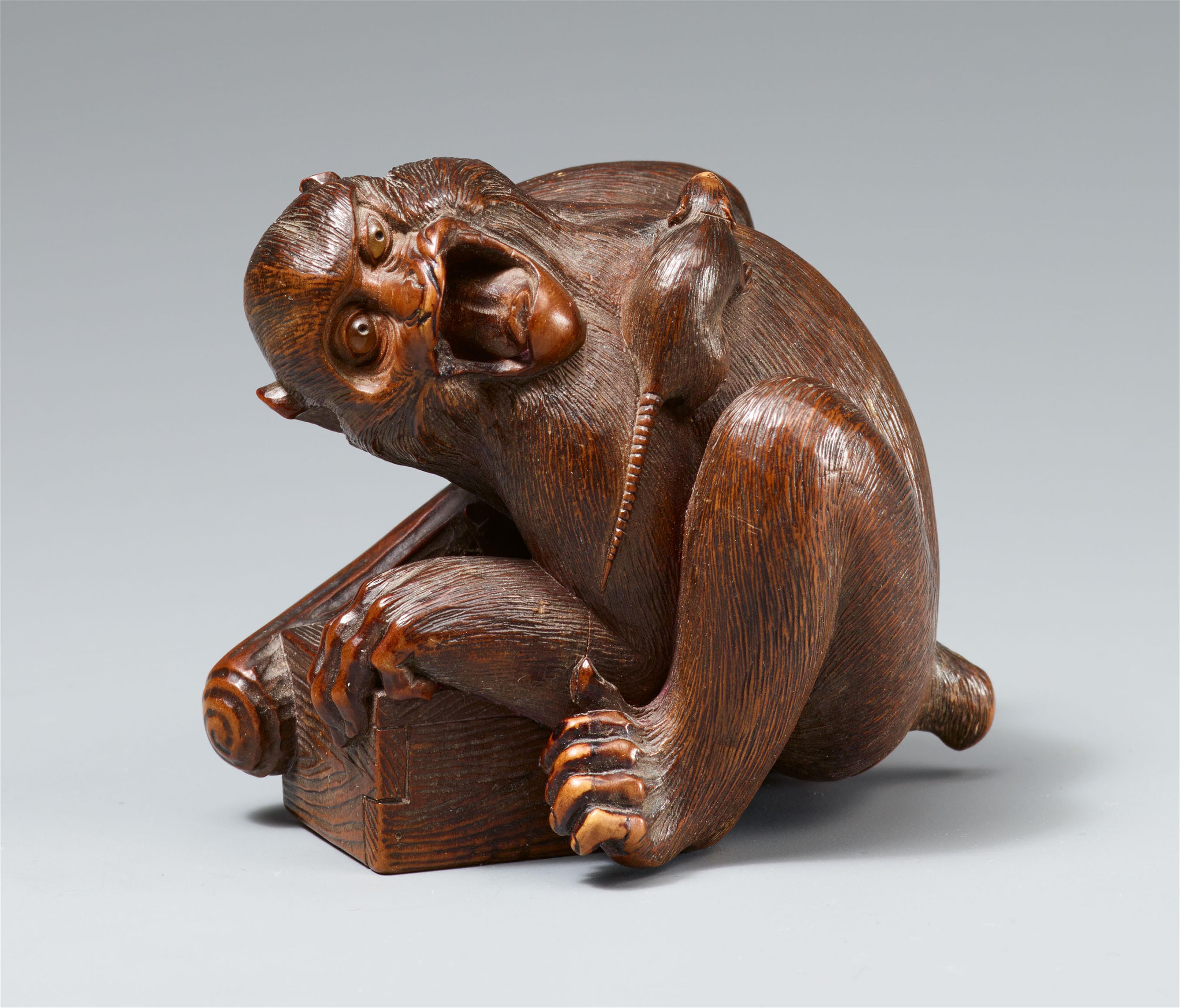 A boxwood okimono of a shouting monkey parodying a luckless rat catcher. Mid-19th century - image-2