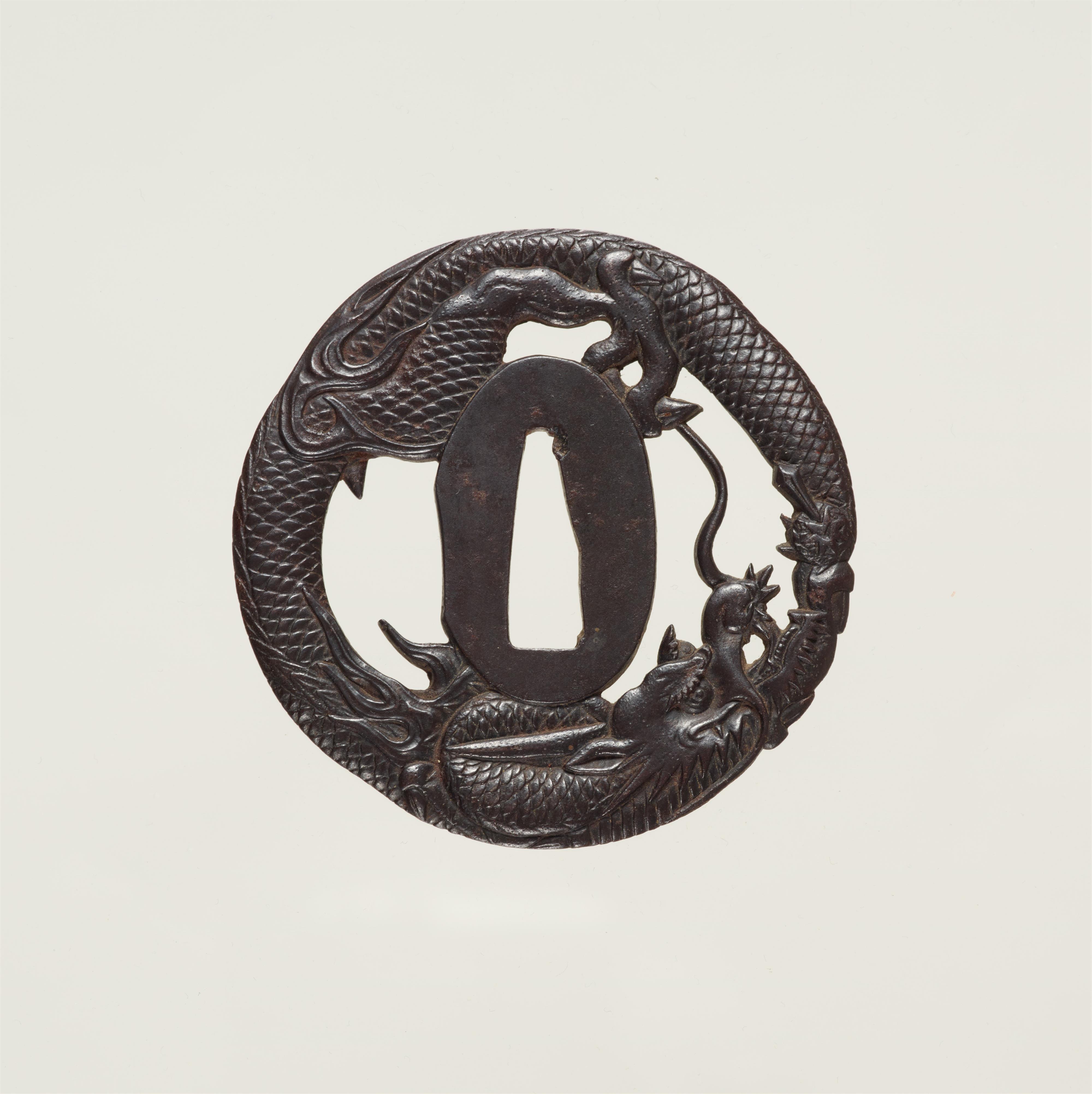 An iron tsuba. Edo period - image-2