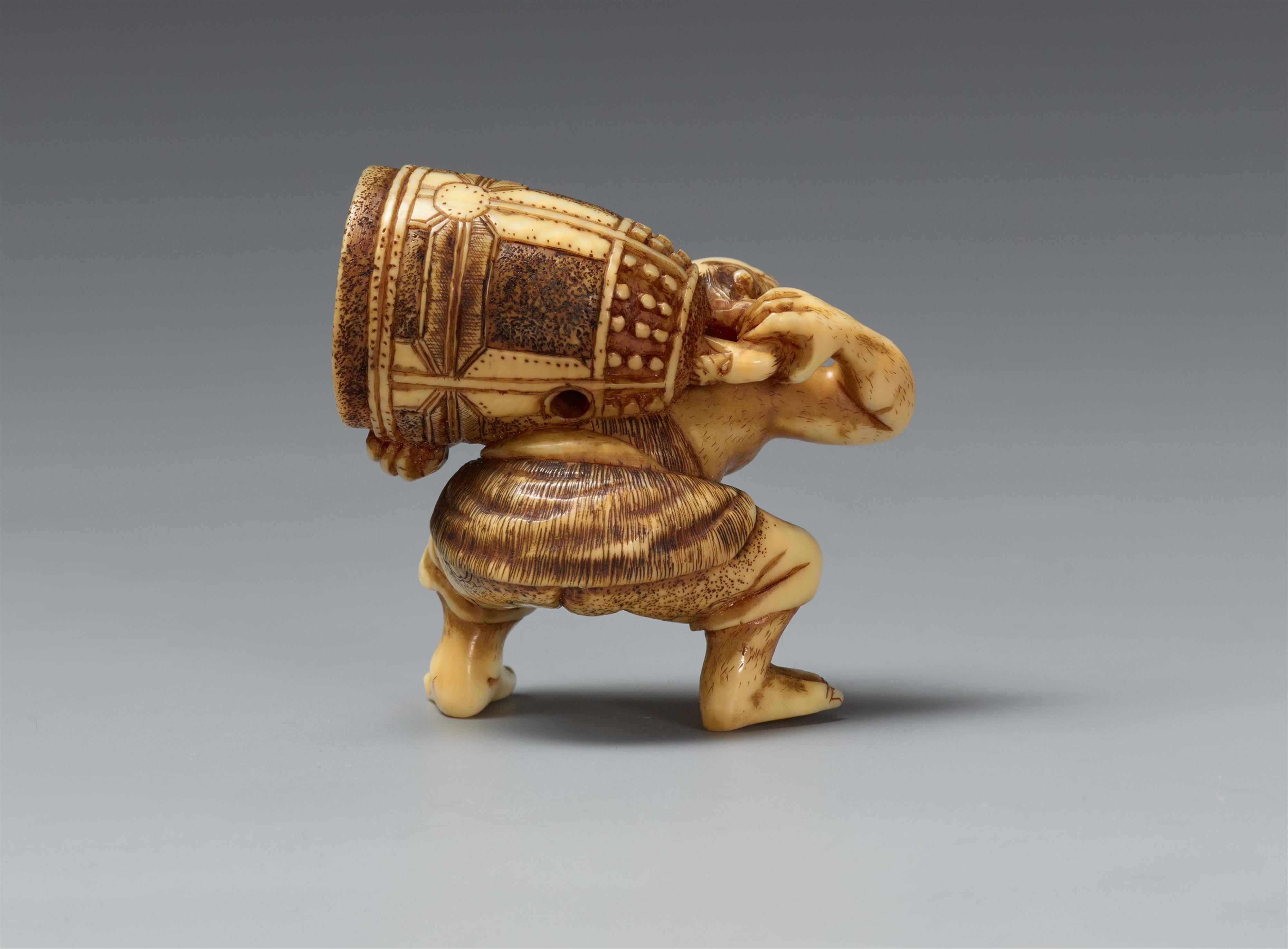 An ivory netsuke of an oni with a bell. Second half 19th century - image-2