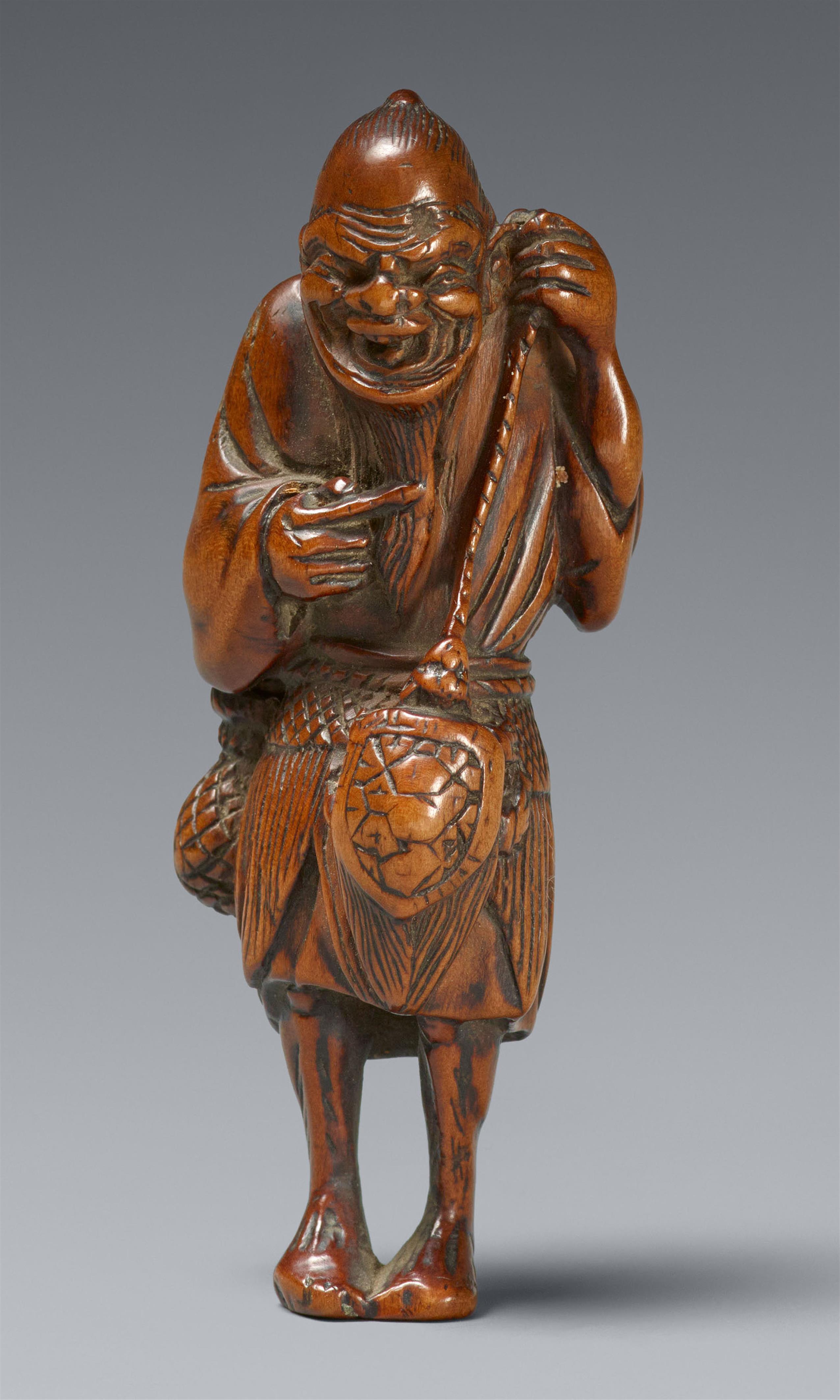 A boxwood netsuke of an old laughing fisherman. 19th century - image-1