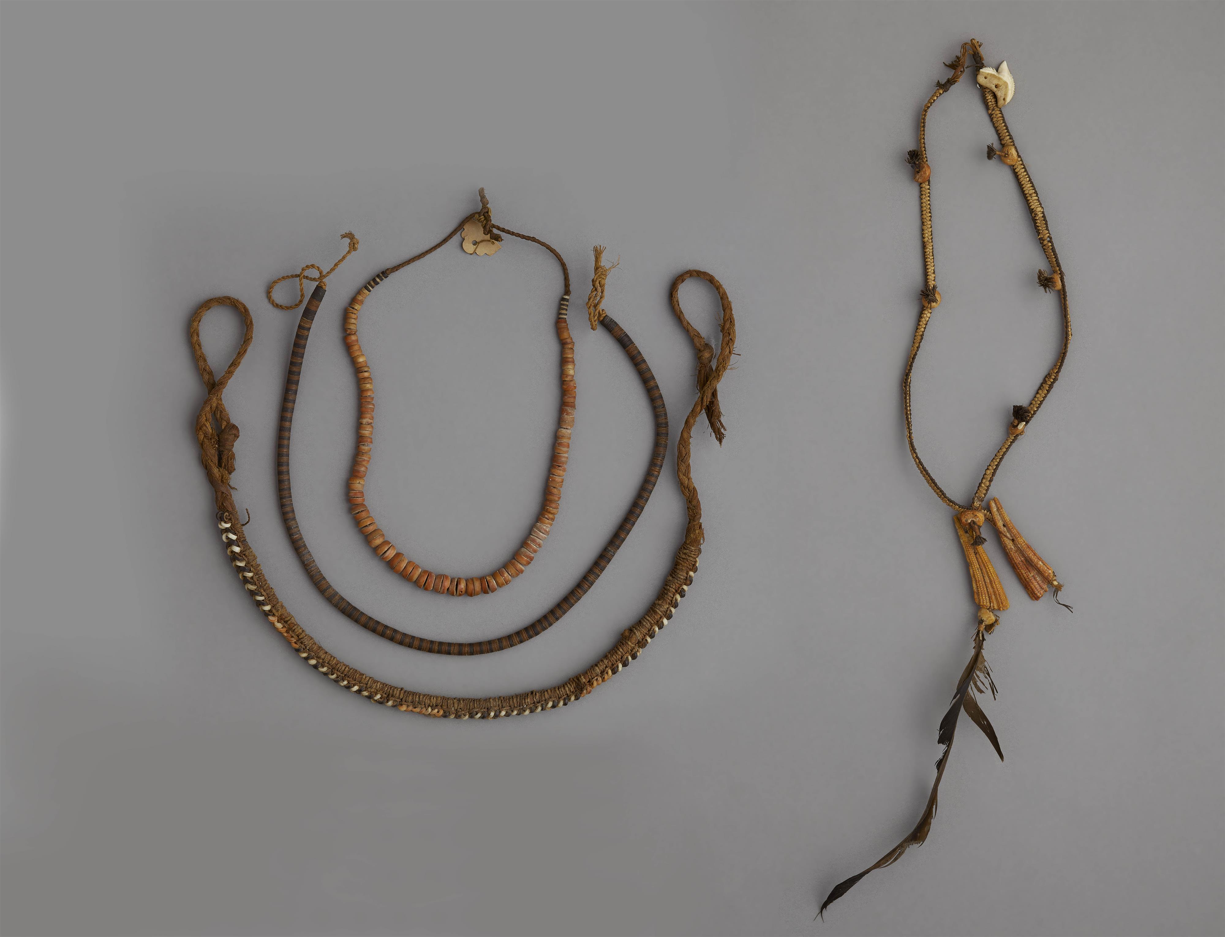 THREE NECKLACES AND A HEAD ORNAMENT - image-1