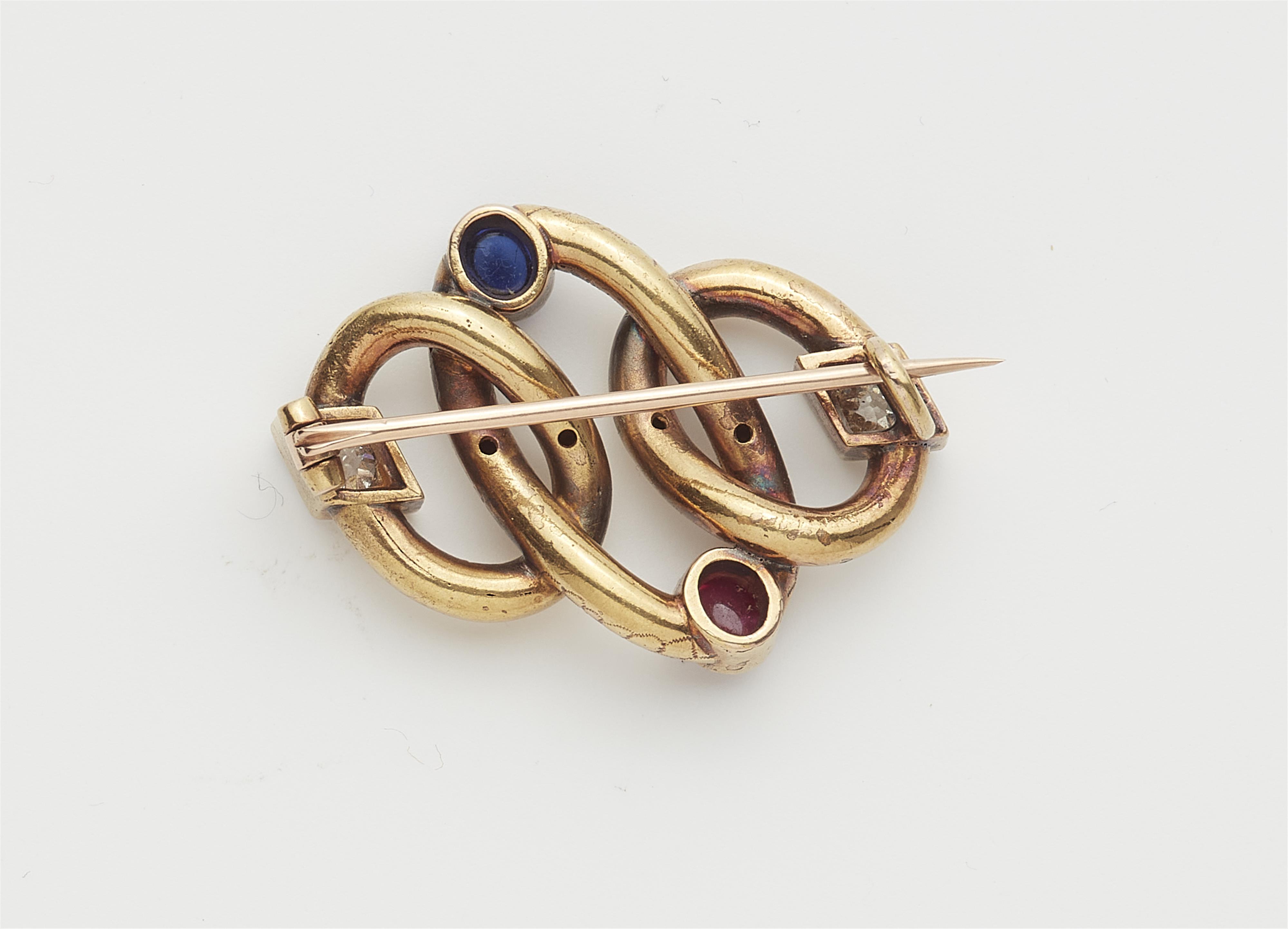 A late 19th century 14k gold sapphire ruby and diamond brooch. - image-2