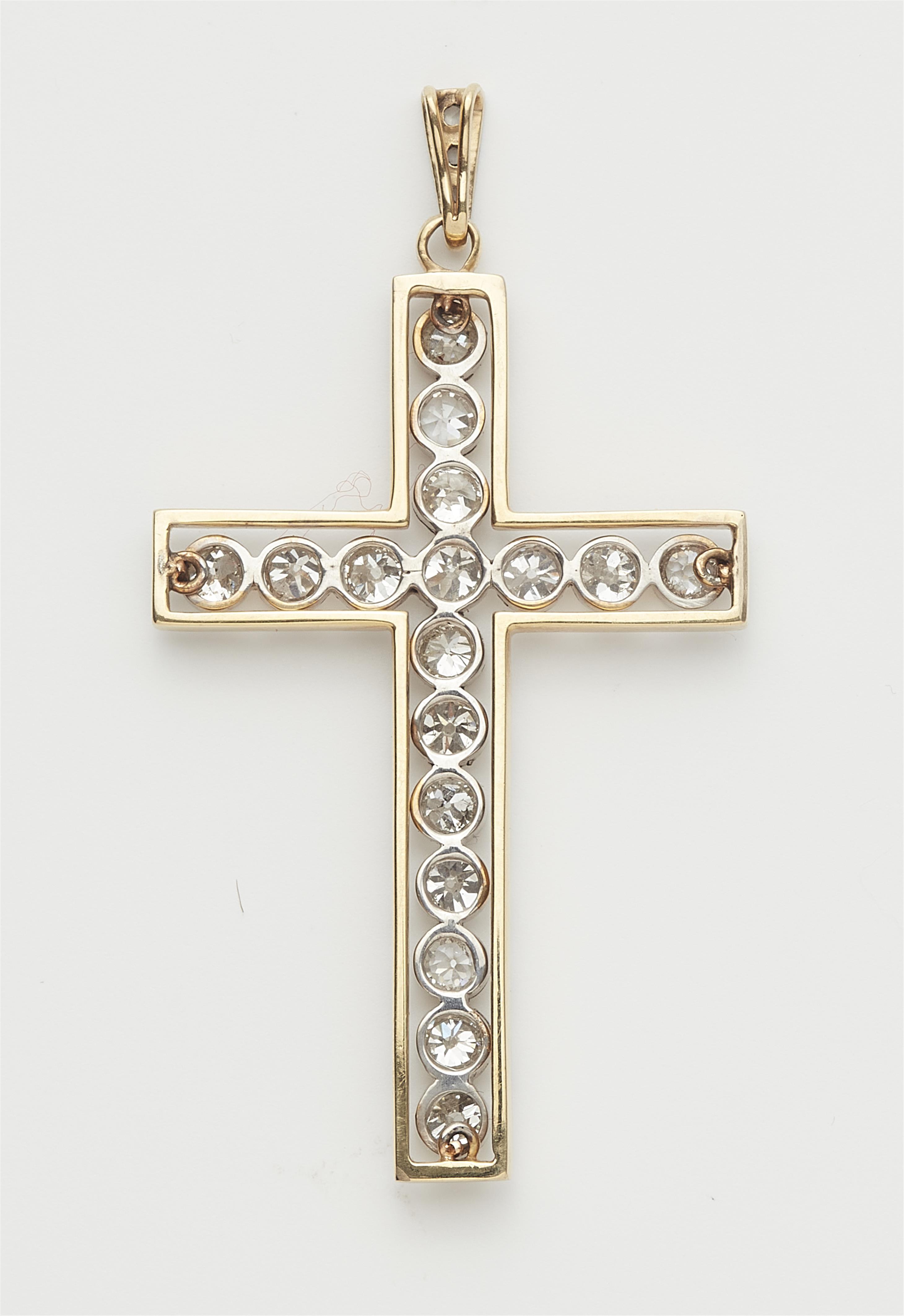 An 18k gold and diamond cross pendant. - image-2