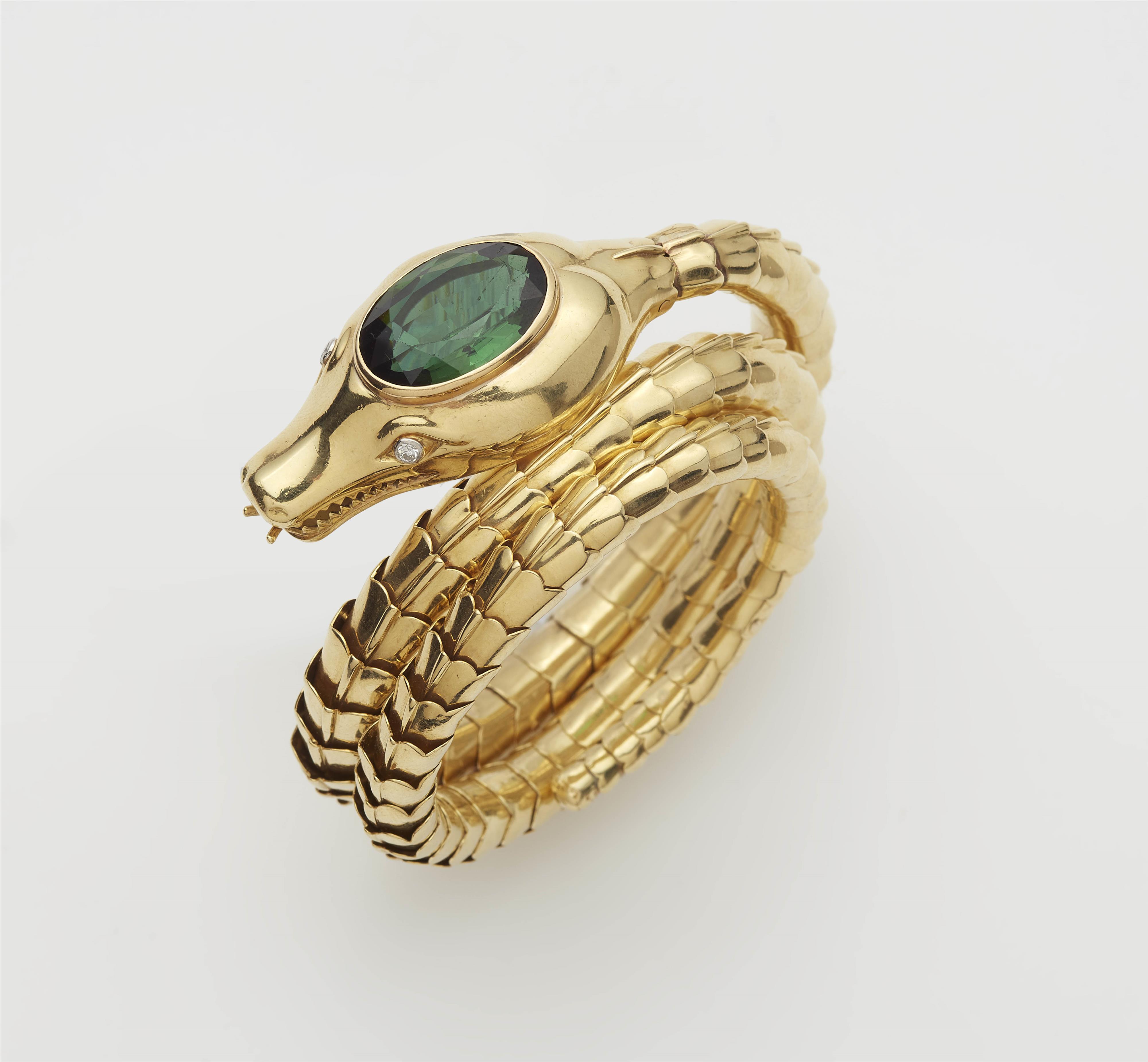 A flexible 18 kt gold diamond and green tourmaline snake bracelet. - image-1