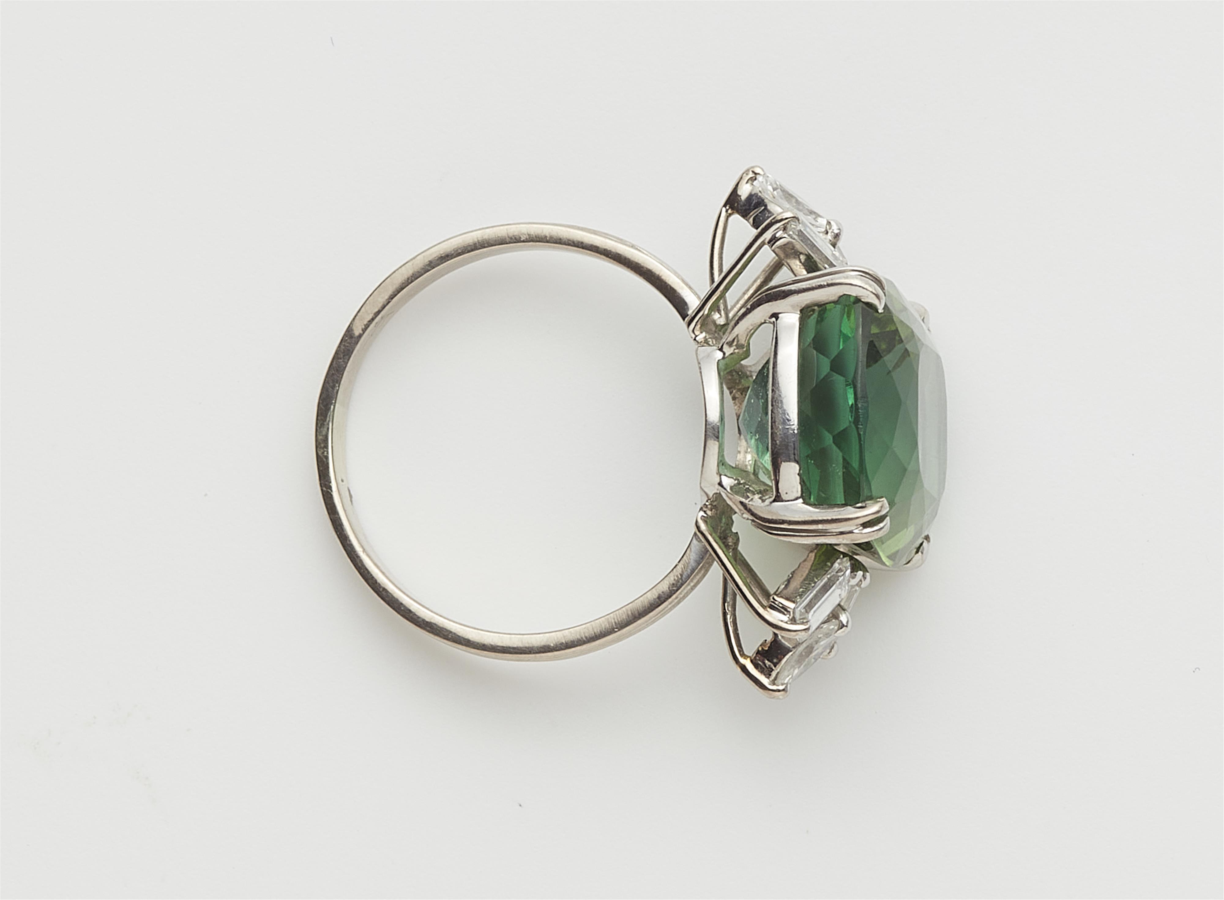 An 18k gold diamond and green tourmaline ring. - image-2