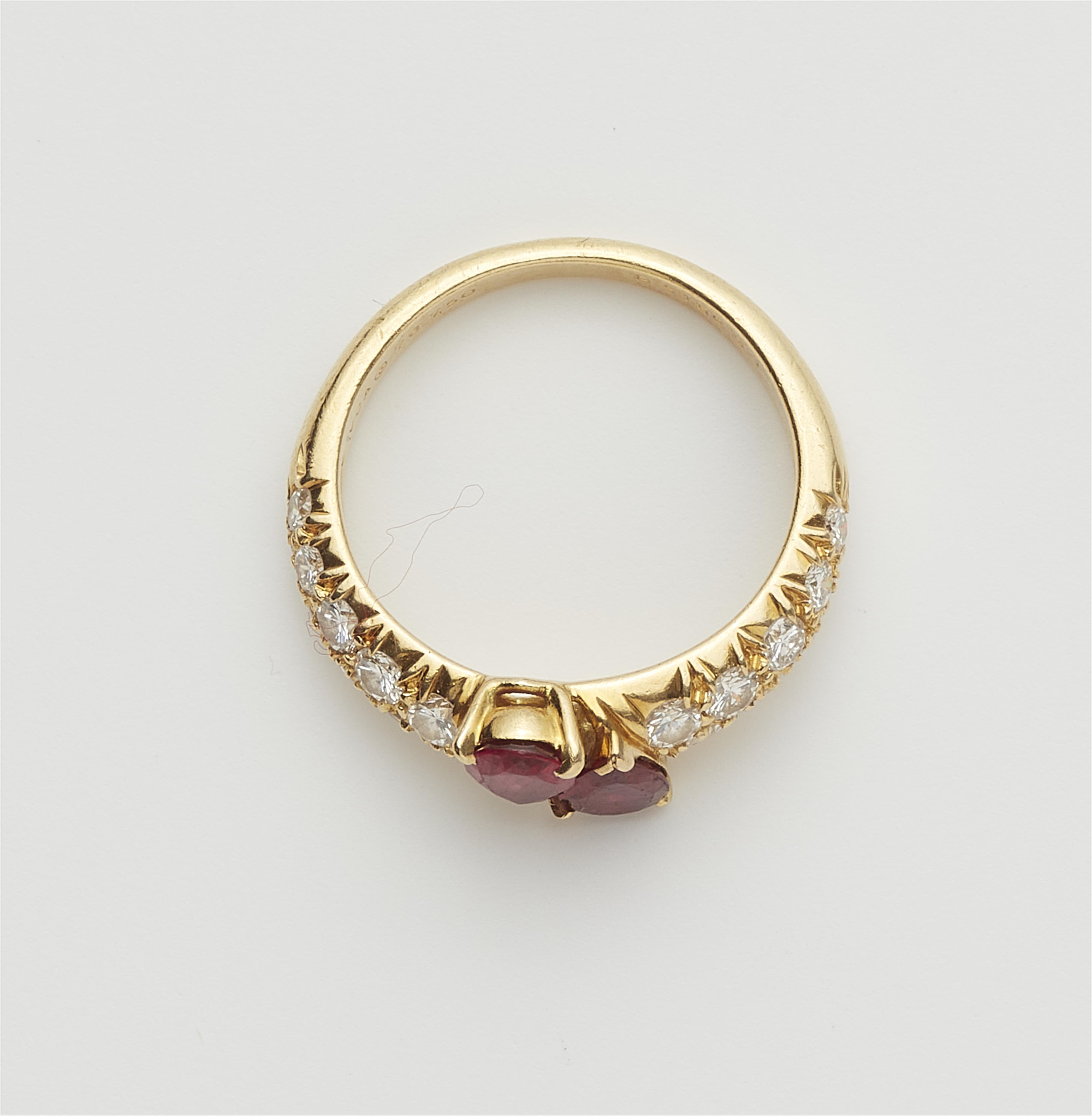 A French 18k gold diamond and pear-cut ruby band ring. - image-2