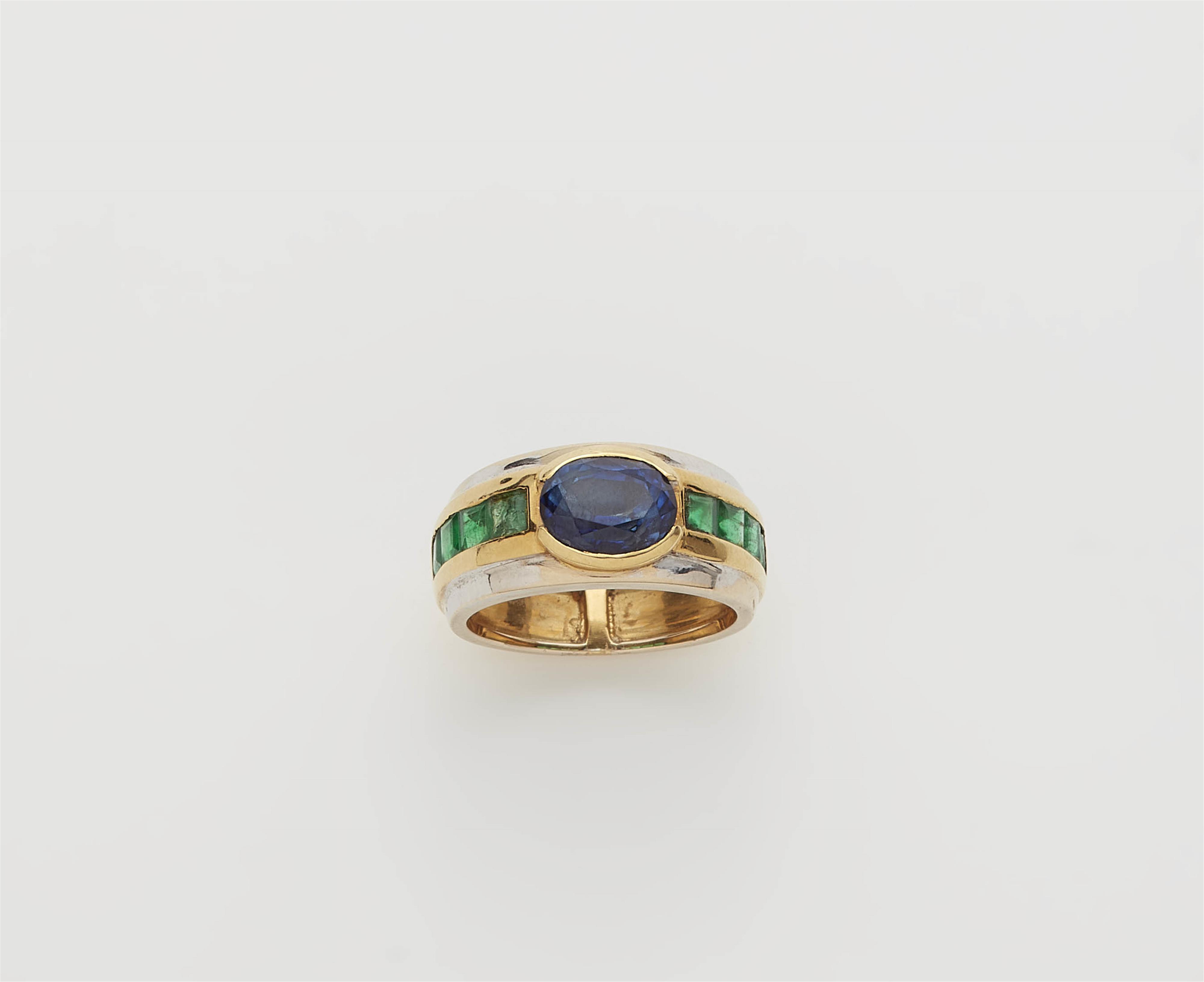 An 18k bicolour gold emerald and sapphire ring. - image-1