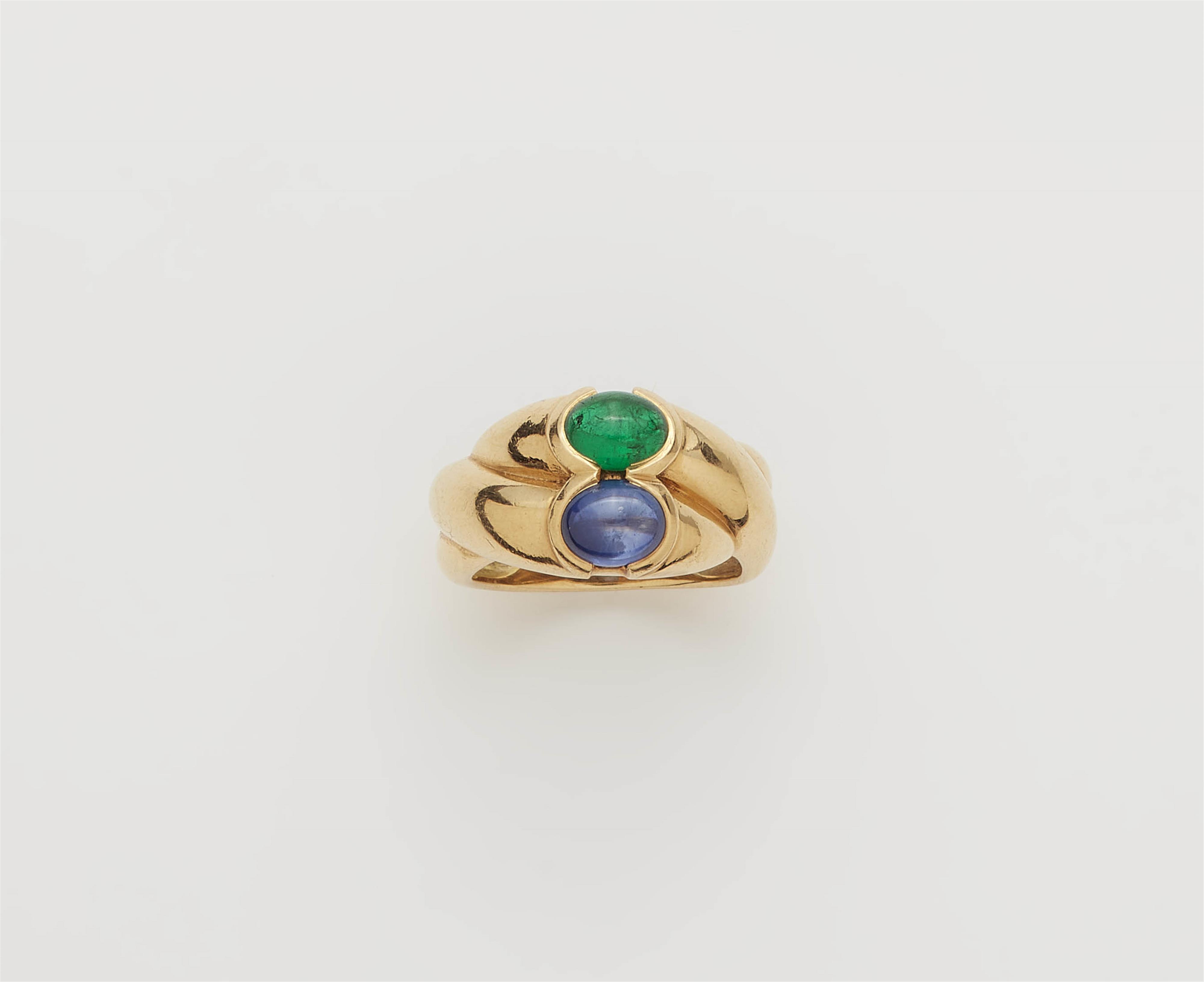 An 18k gold sapphire and emerald cabochon band ring. - image-1