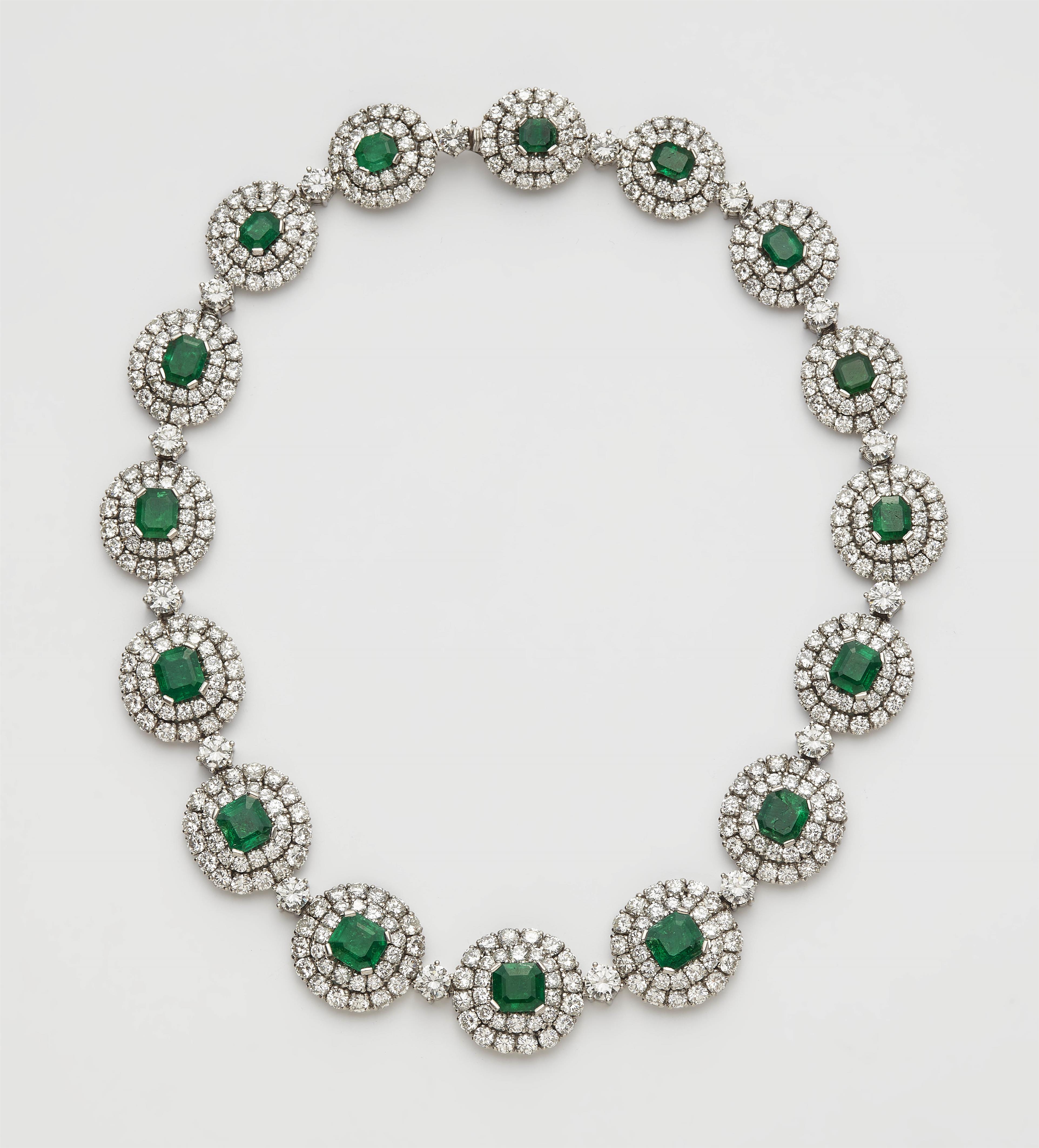 A German platinum diamond and emerald cocktail necklace. - image-1
