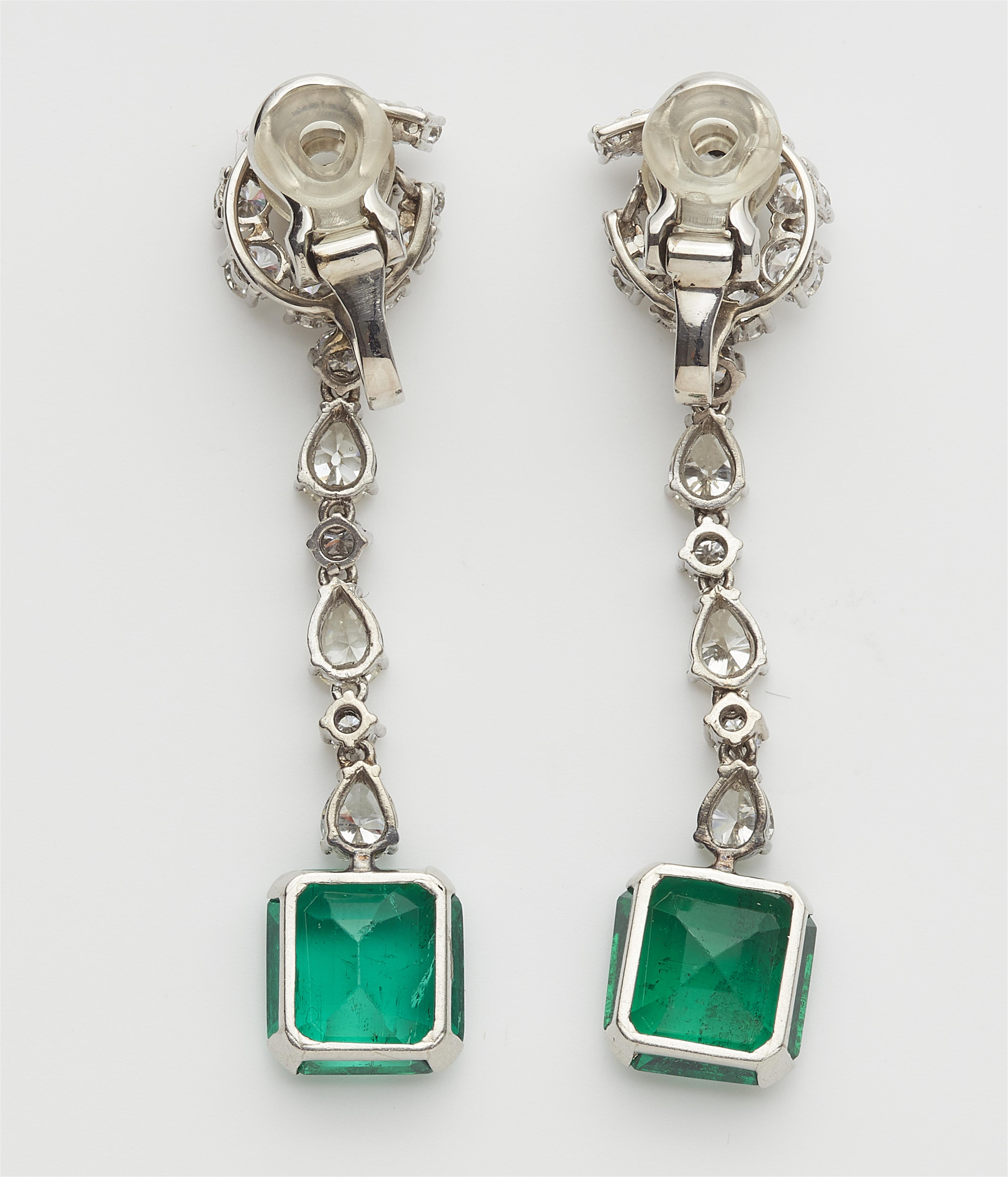 A pair of 18k gold diamond and emerald cocktail earrings. - image-2