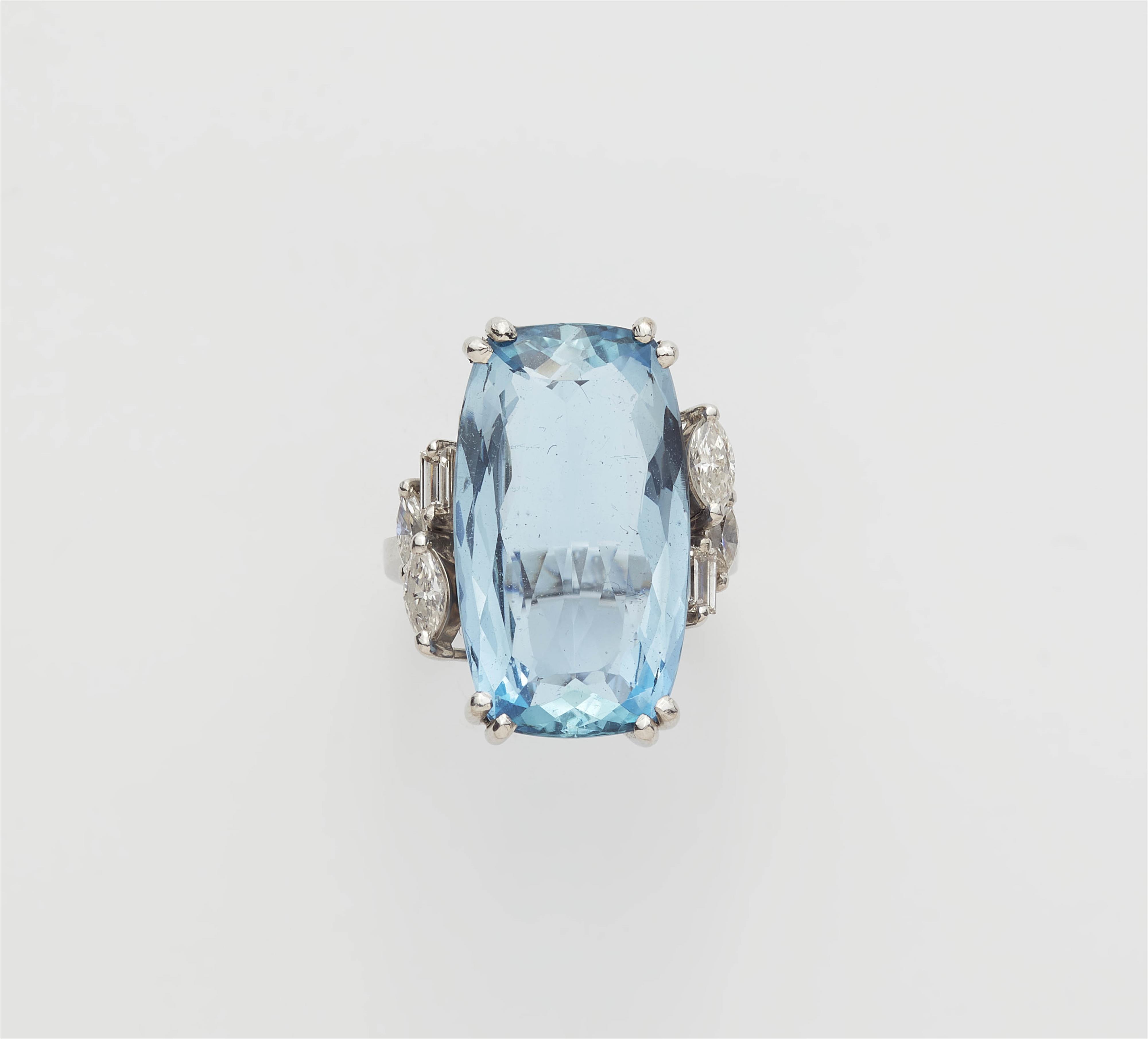 An 18k gold diamond and ca. 10.50 ct aquamarine cocktail ring. - image-1