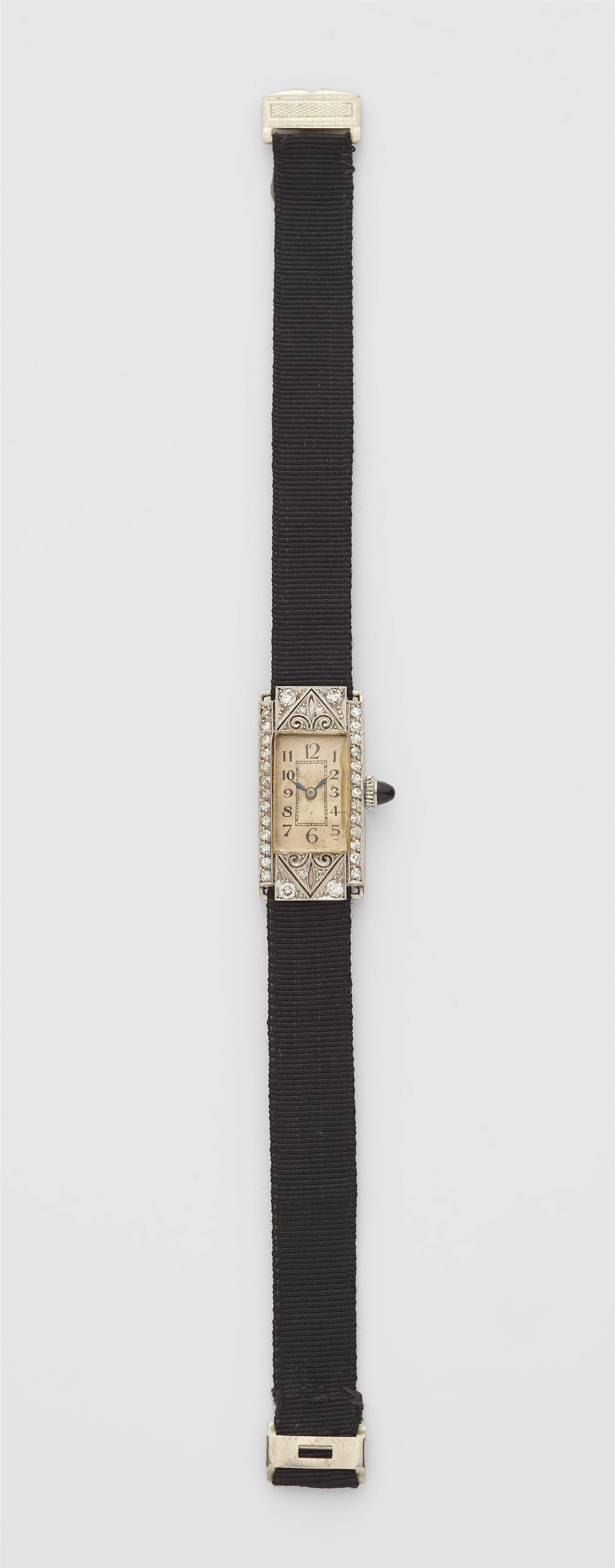 A platinum and diamond Art Deco ladies wristwatch. - image-1