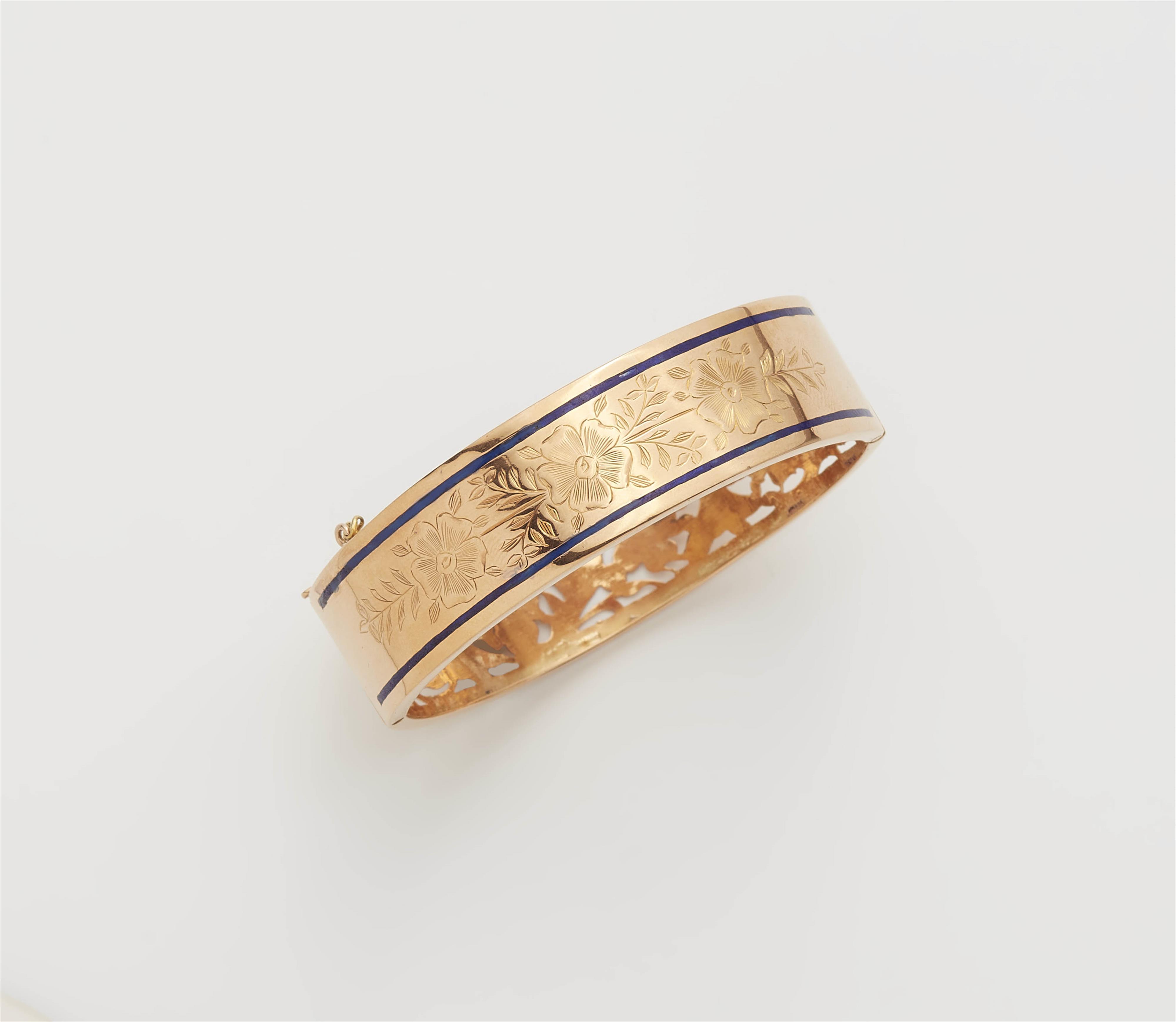 An Italian 18k gold and blue enamel bangle. - image-1