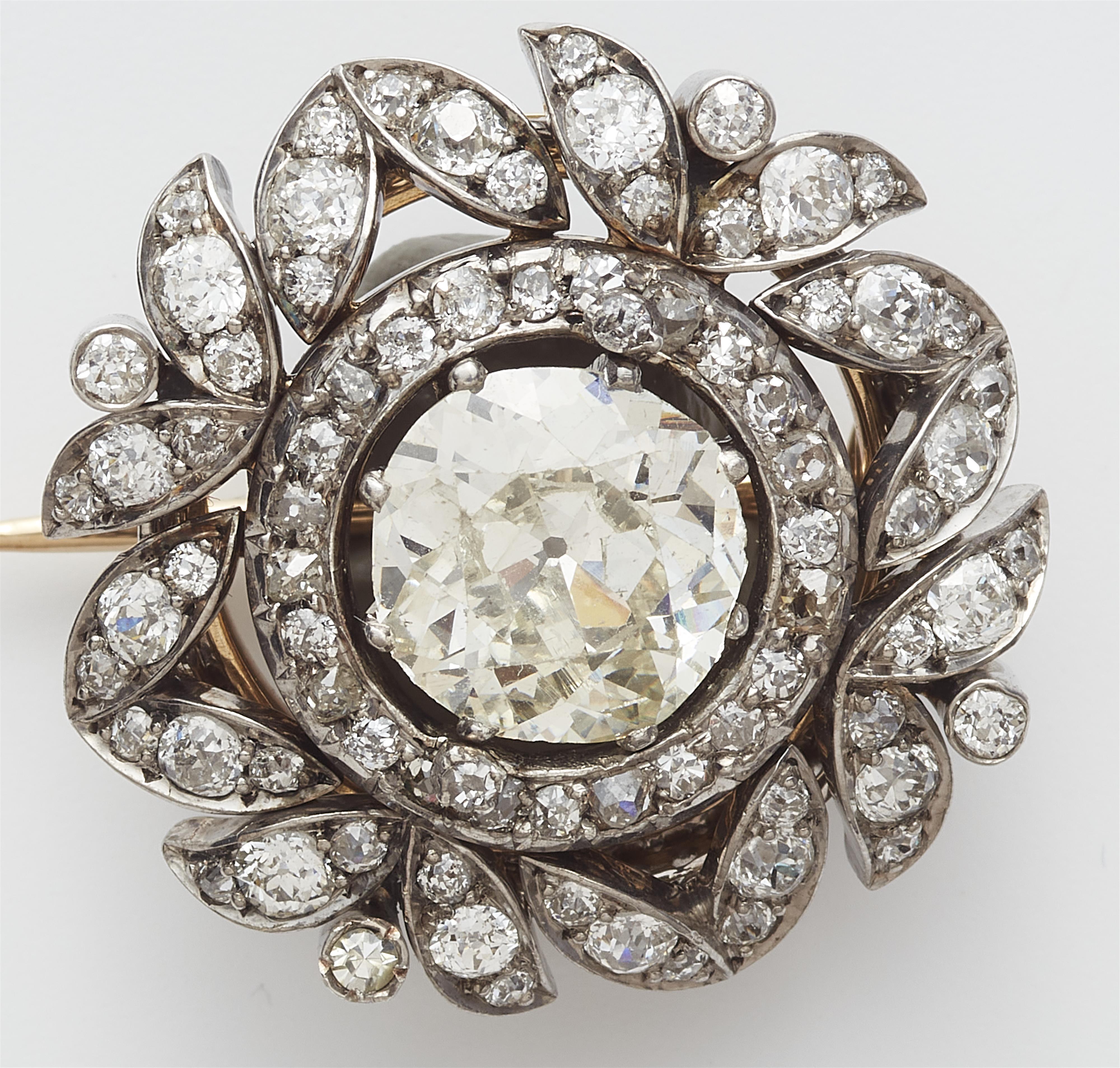 A Viennese 14k gold diamond brooch with a ca. 3.23 ct European old-cut centre stone. - image-4