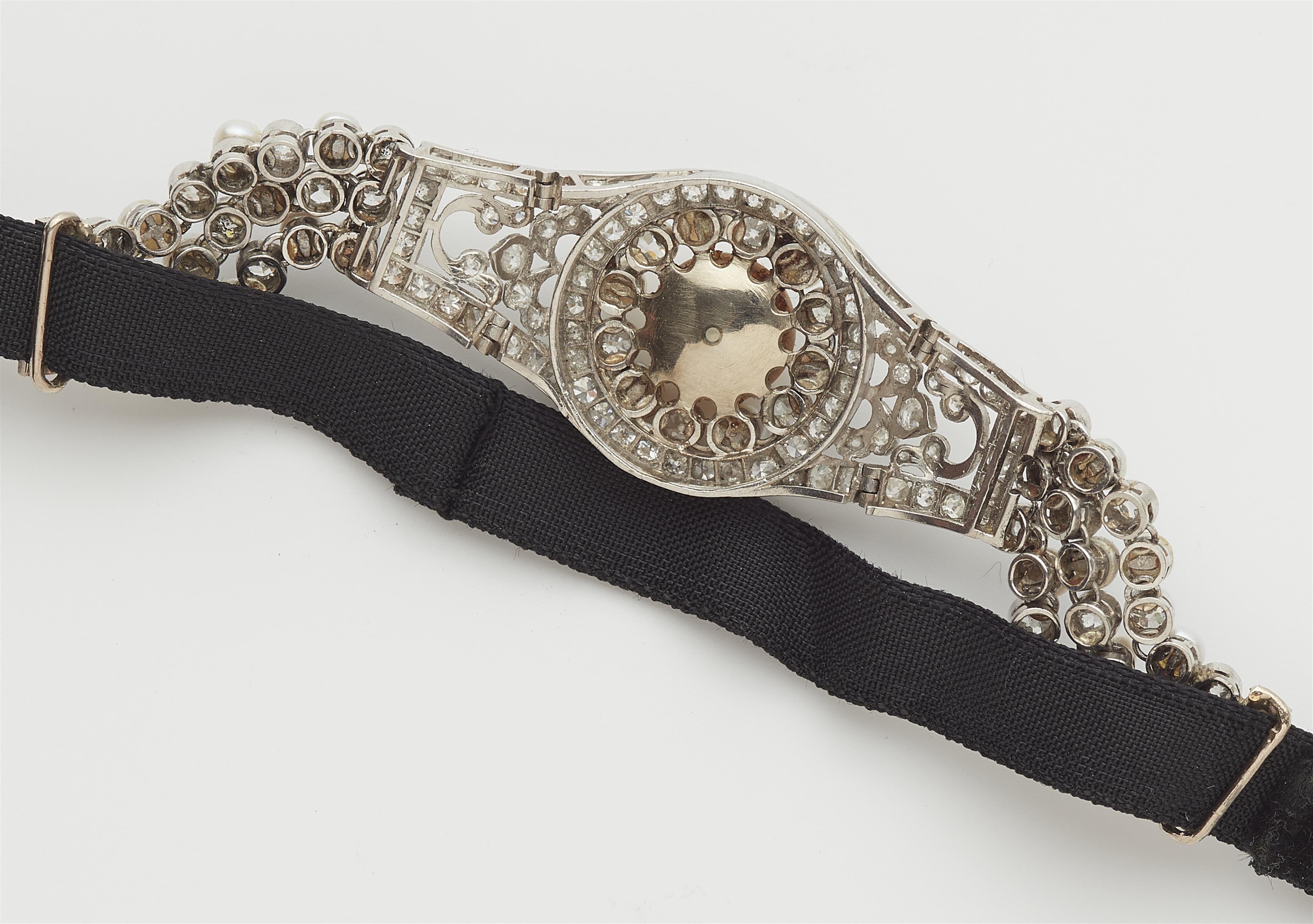 A French platinum diamond and pearl buckle bracelet with later velvet strap. - image-2