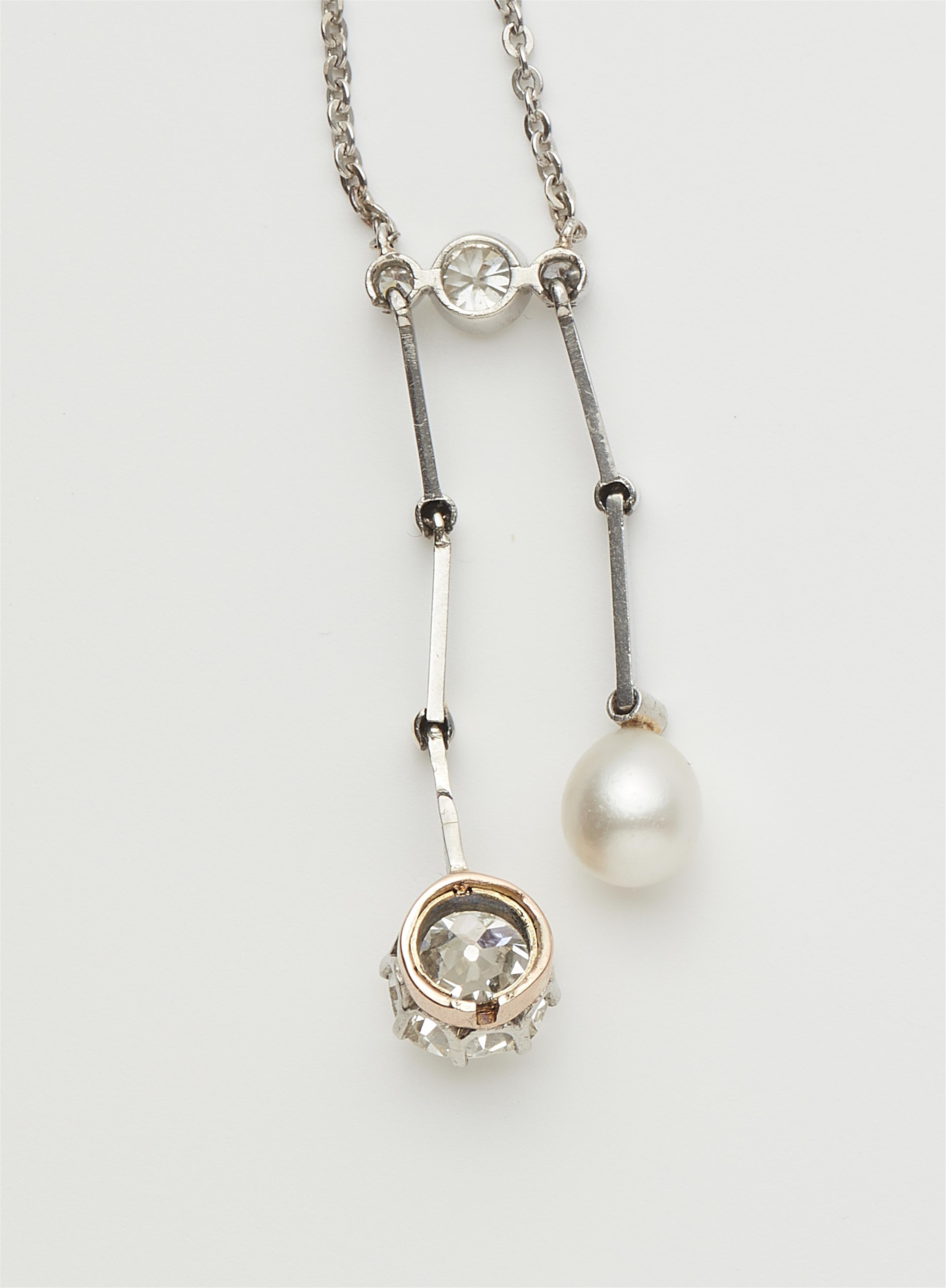 A platinum necklace with a gold platinum pearl and old mine-cut diamond negligé pendant. - image-2