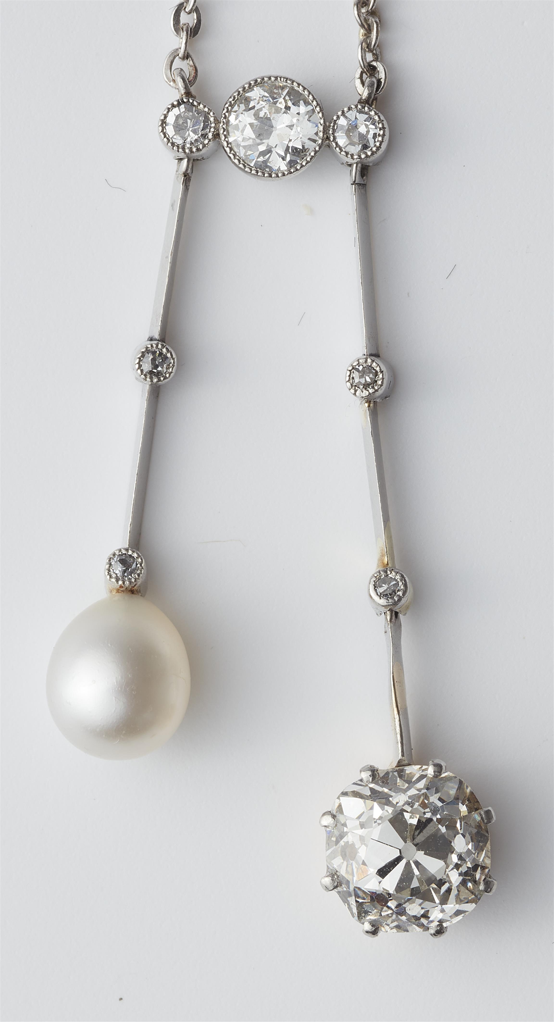 A platinum necklace with a gold platinum pearl and old mine-cut diamond negligé pendant. - image-3