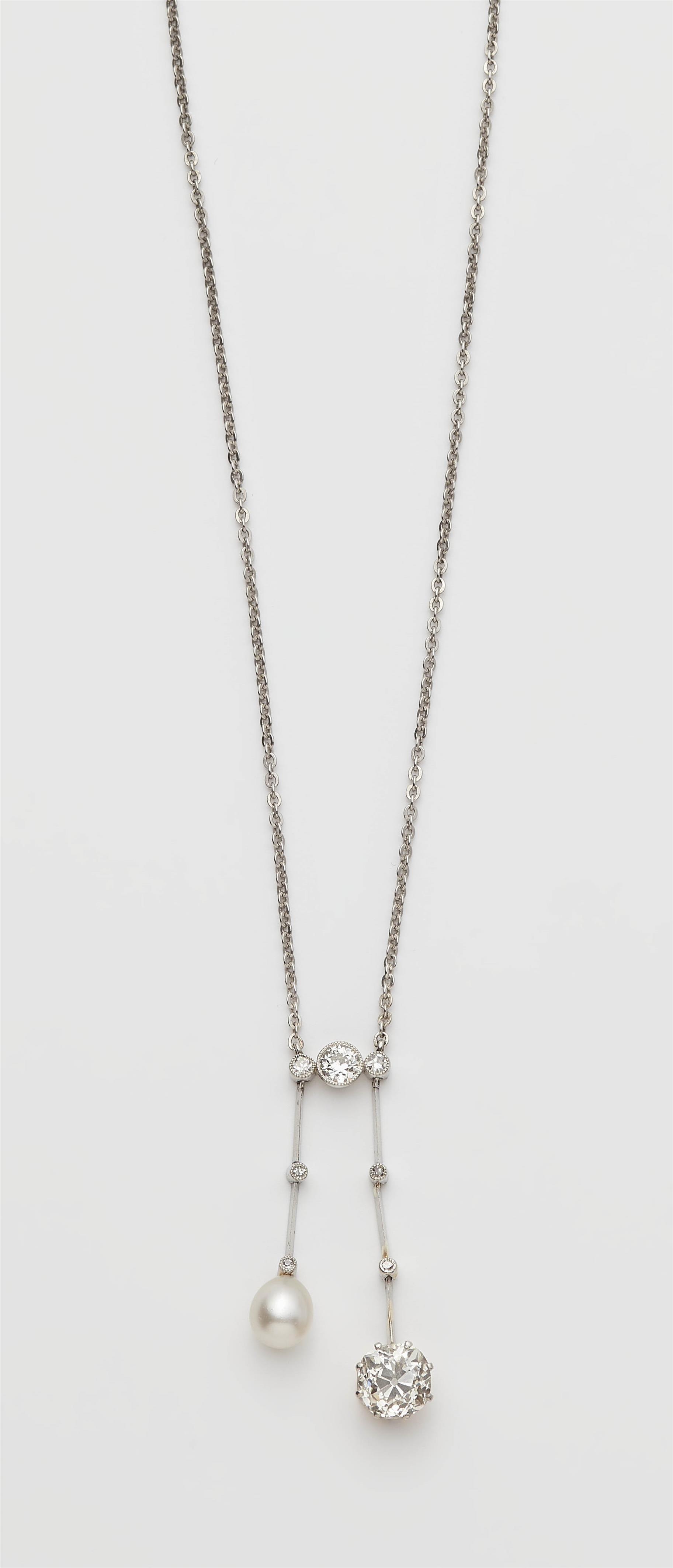 A platinum necklace with a gold platinum pearl and old mine-cut diamond negligé pendant. - image-1