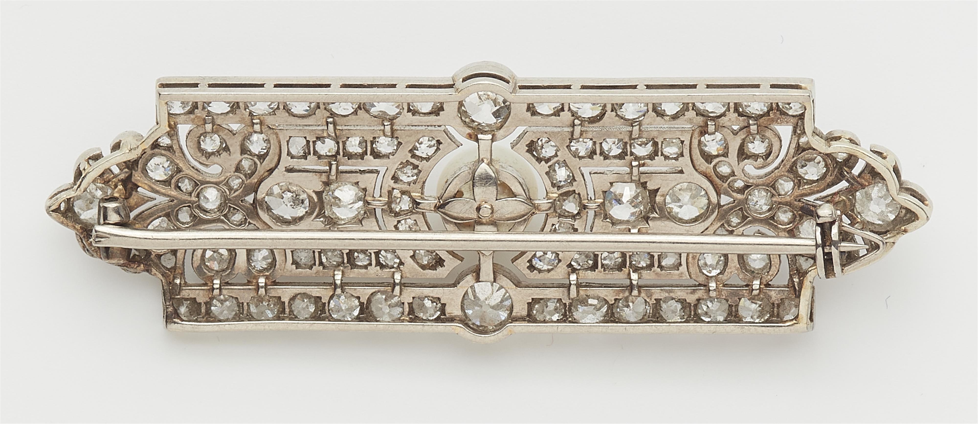 An Art Deco 18k white gold diamond and pearl brooch. - image-2