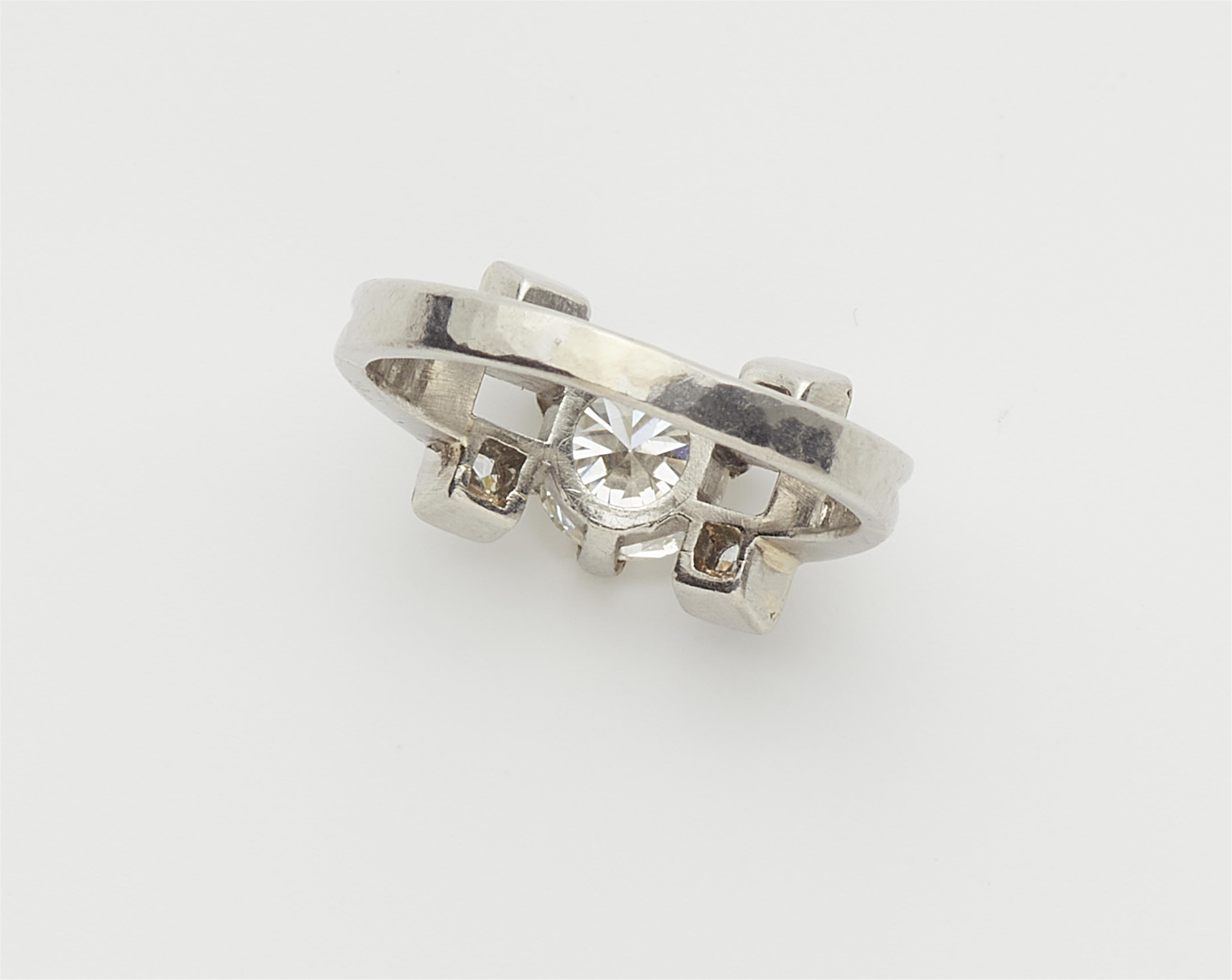 A platinum and diamond five stone ring. - image-2